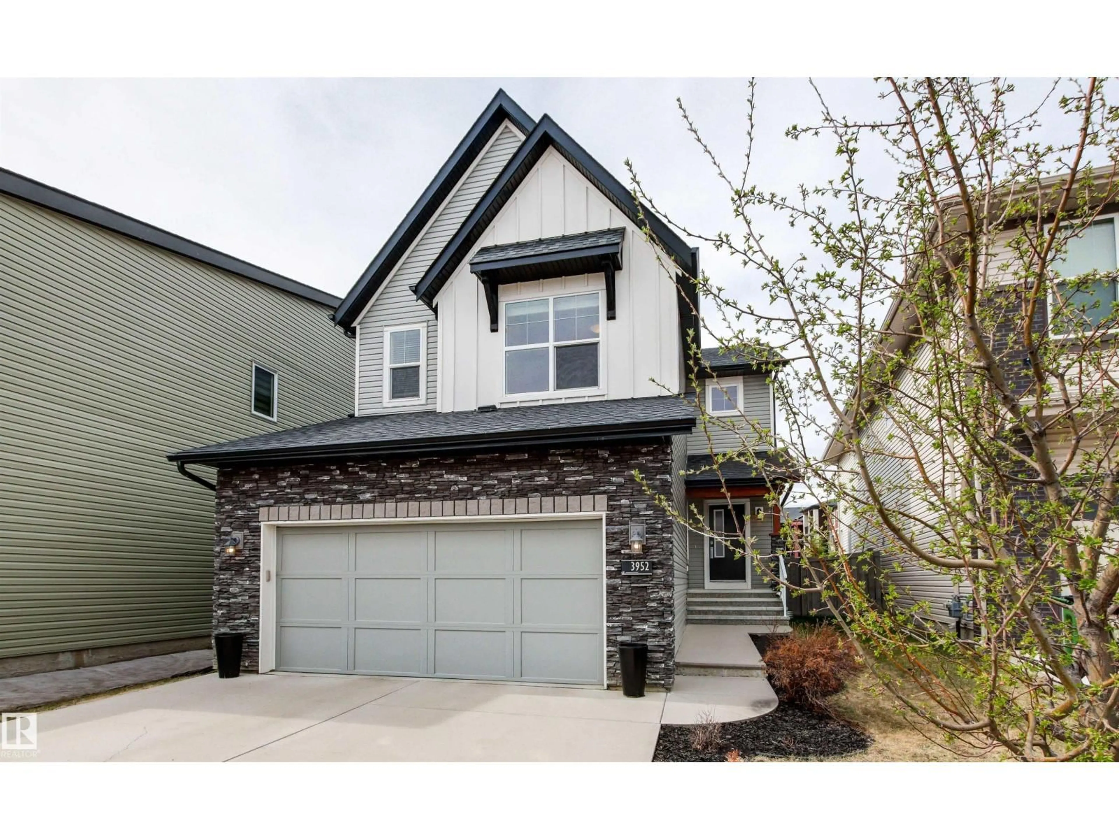 Home with vinyl exterior material, street for SW - 3952 CLAXTON LO, Edmonton Alberta T6W1Y7