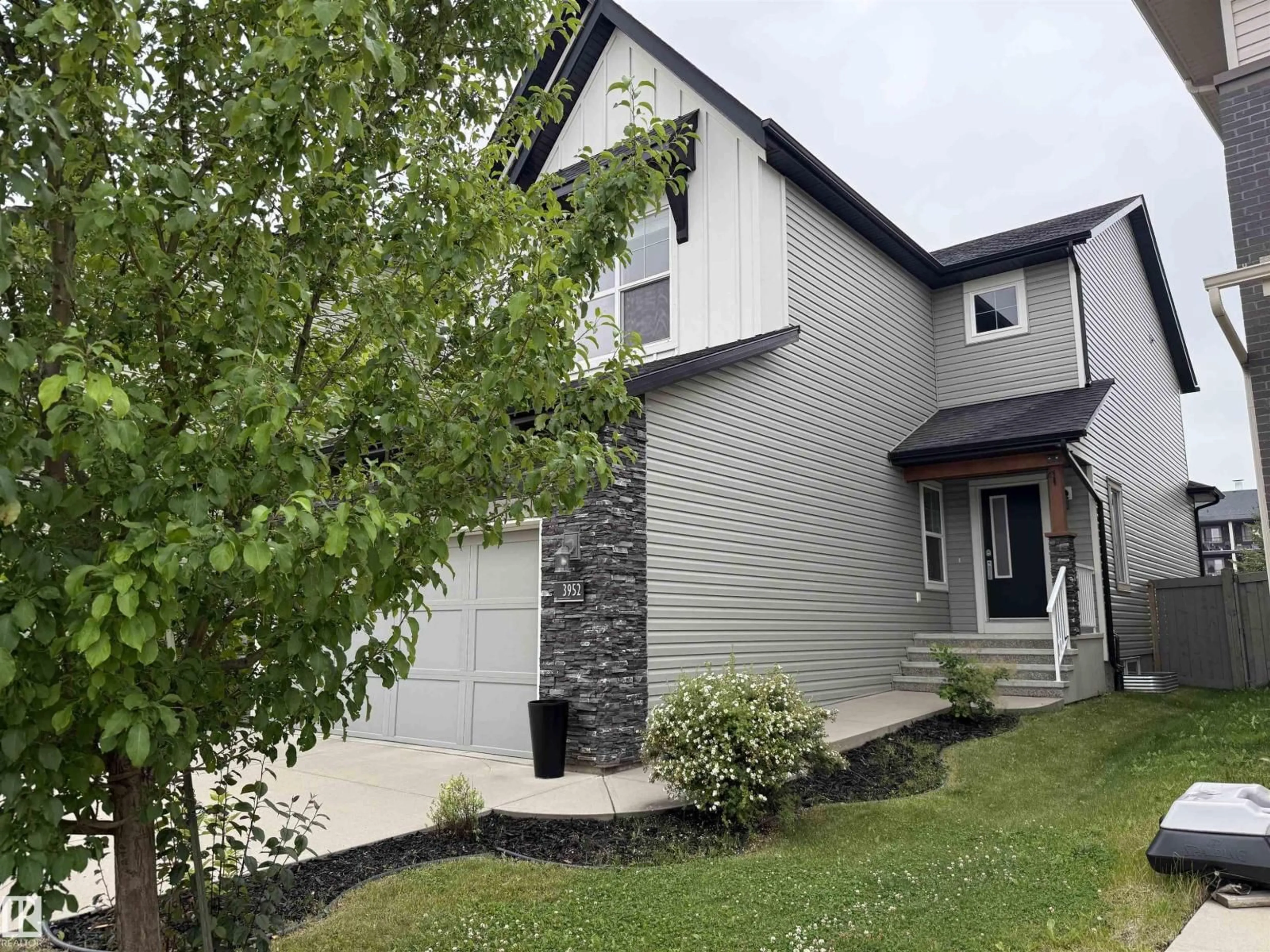 Home with vinyl exterior material, street for SW - 3952 CLAXTON LO, Edmonton Alberta T6W1Y7
