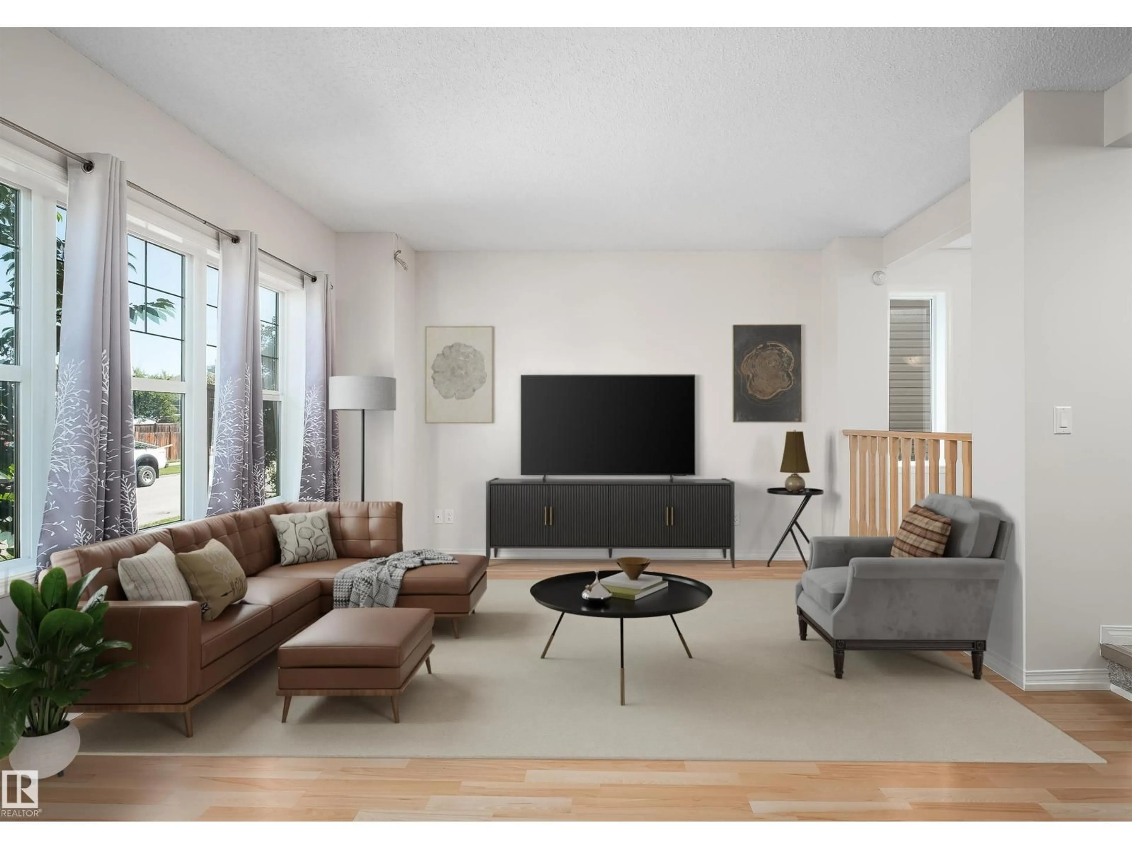 Living room with furniture, wood/laminate floor for 243 SOUTHWICK WY, Leduc Alberta T9E0G1