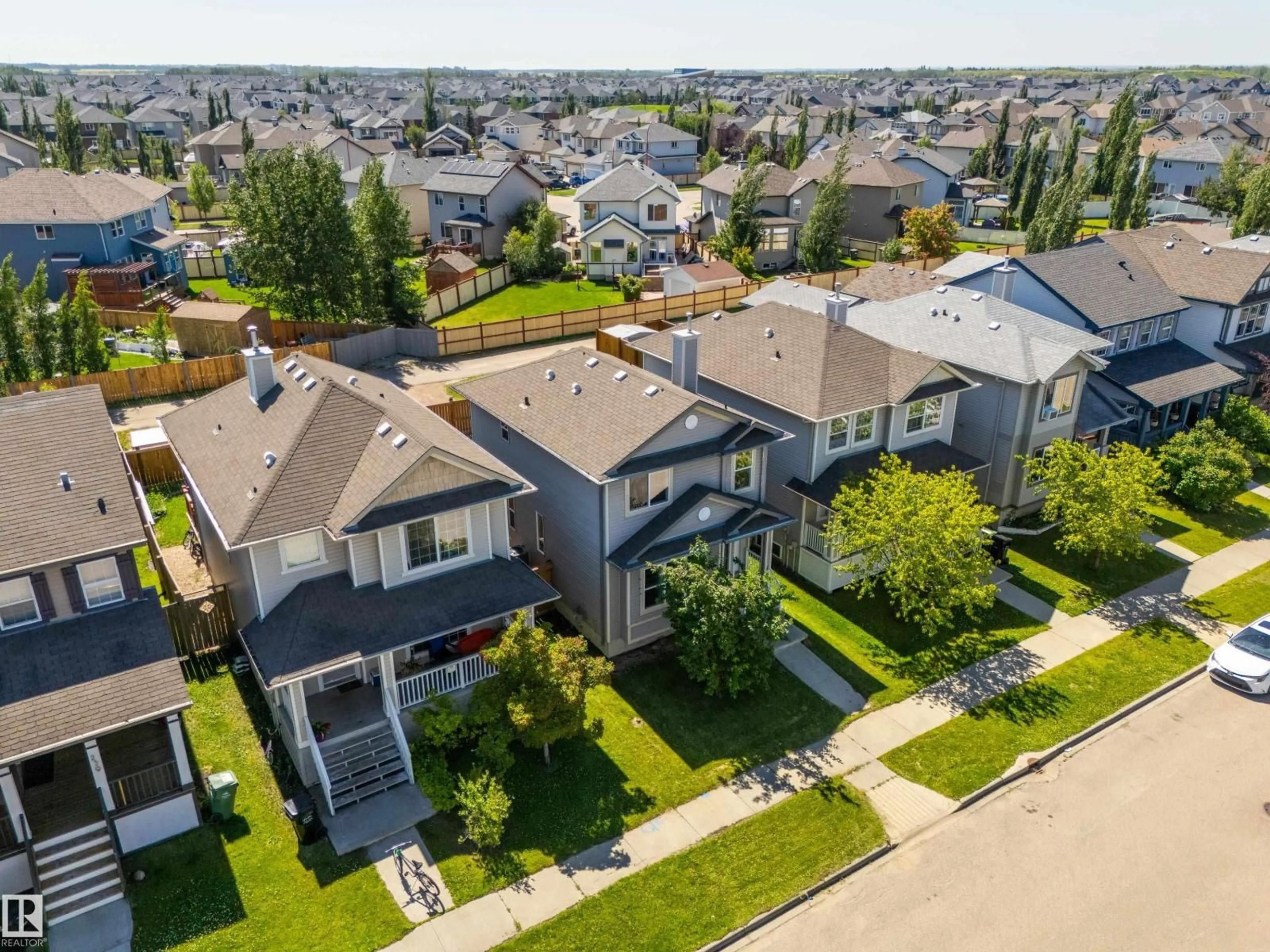 A pic from outside/outdoor area/front of a property/back of a property/a pic from drone, street for 243 SOUTHWICK WY, Leduc Alberta T9E0G1