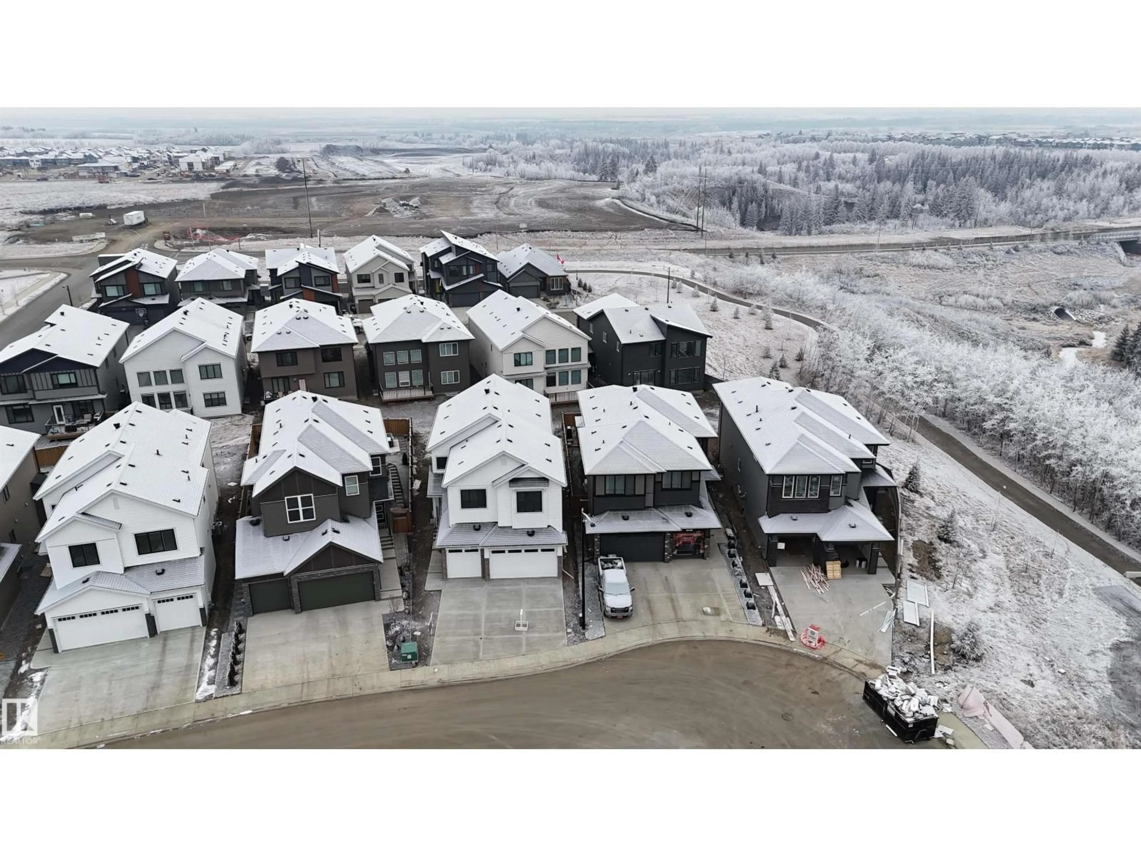 A pic from outside/outdoor area/front of a property/back of a property/a pic from drone, mountain view for 17115 3 ST, Edmonton Alberta T5Y4G8