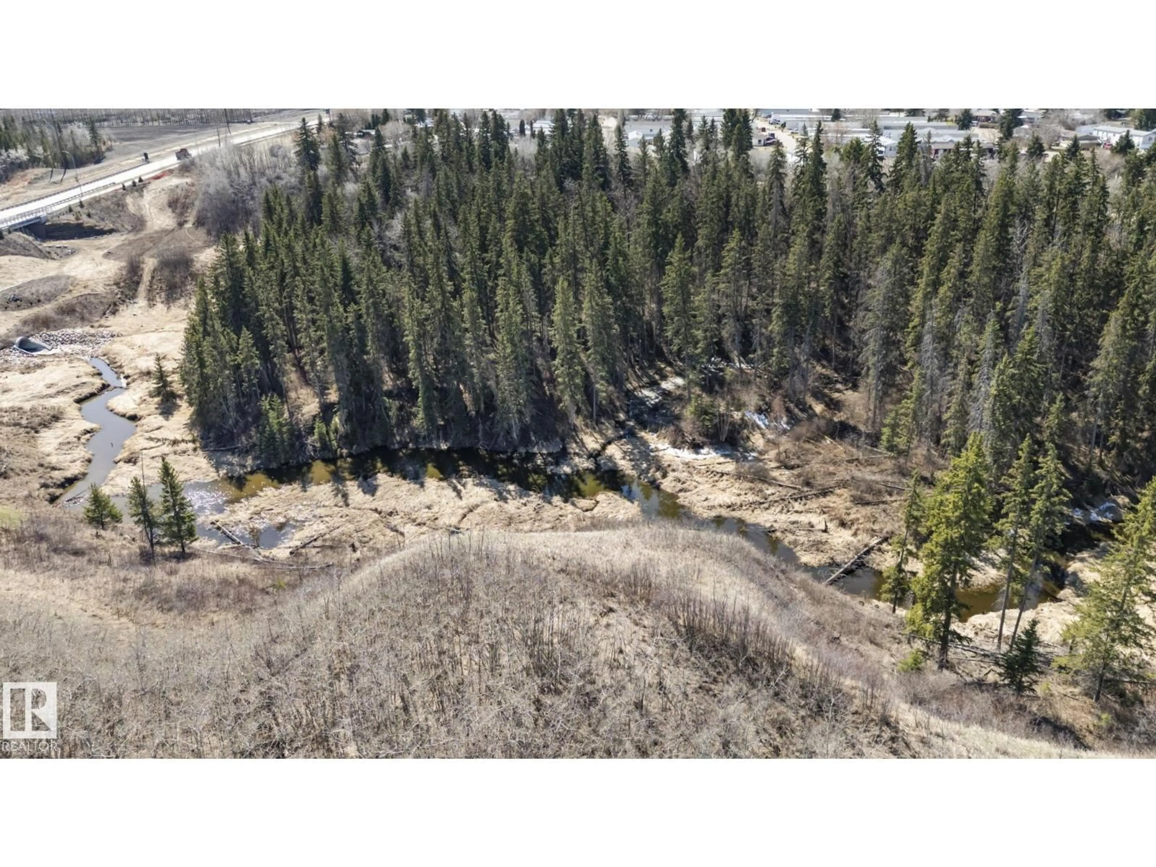 A pic from outside/outdoor area/front of a property/back of a property/a pic from drone, forest/trees view for 17115 3 ST, Edmonton Alberta T5Y4G8