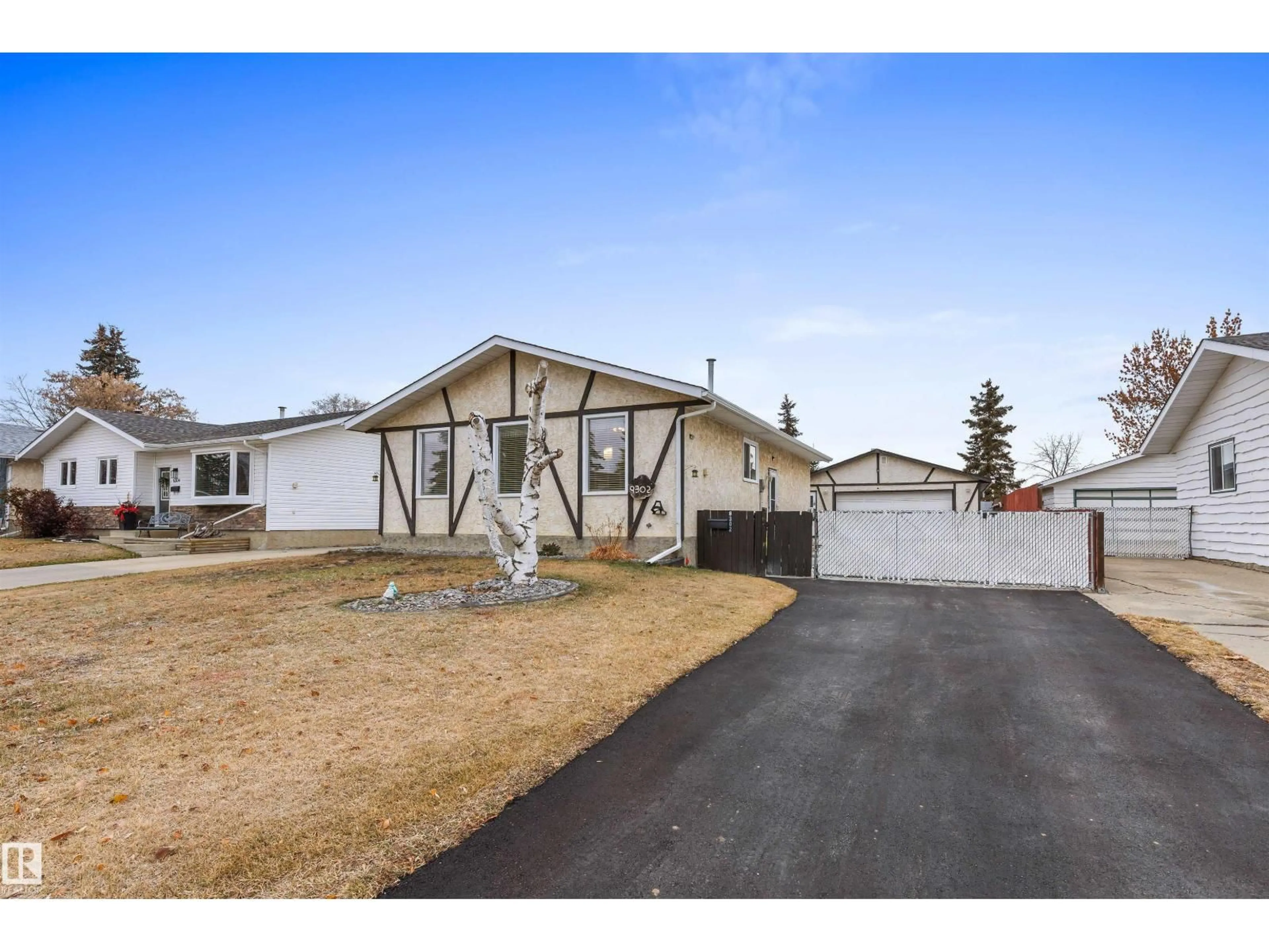 Home with vinyl exterior material, street for 9302 99A, Morinville Alberta T8R1J6