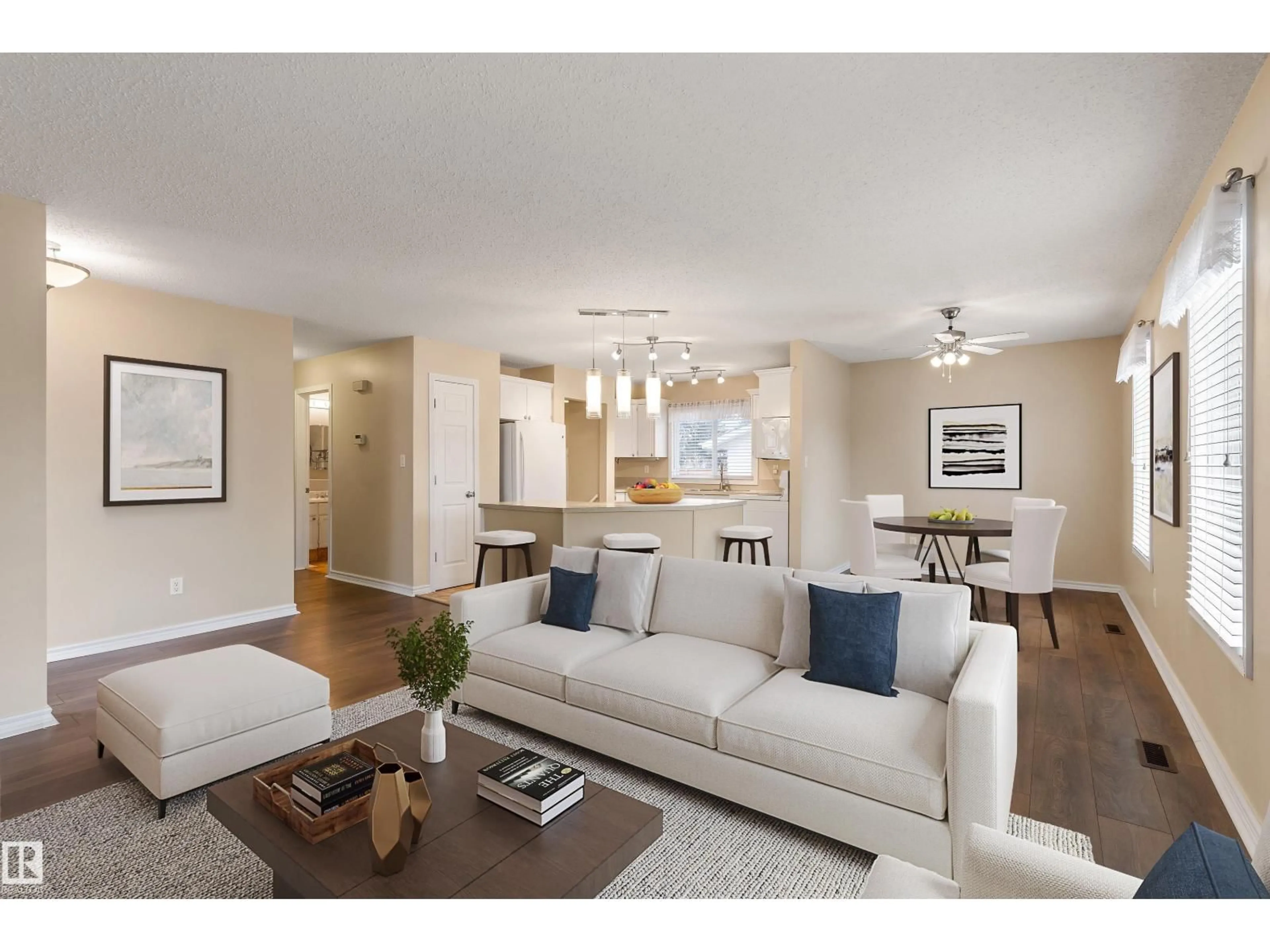 Living room with furniture, wood/laminate floor for 9302 99A, Morinville Alberta T8R1J6