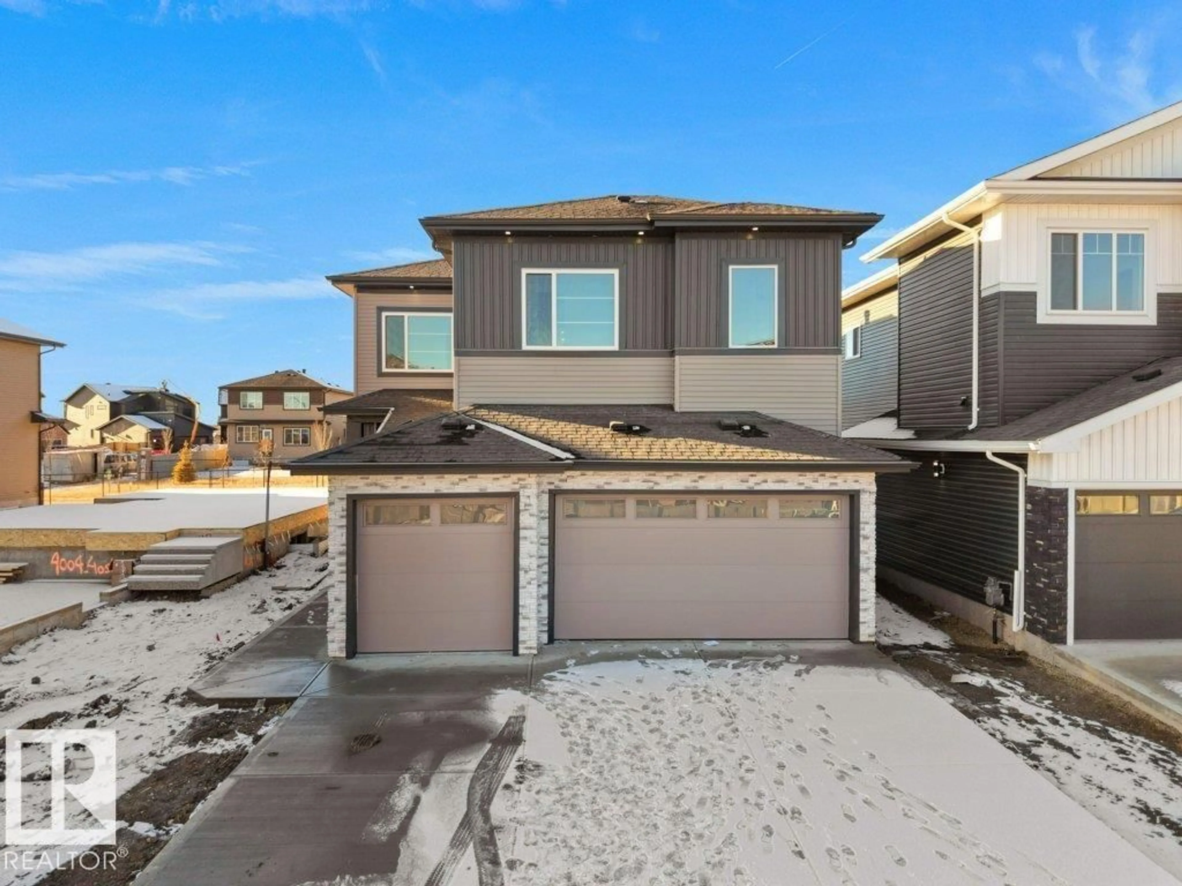 Home with vinyl exterior material, street for 4006 40 ST, Beaumont Alberta T4X3B6