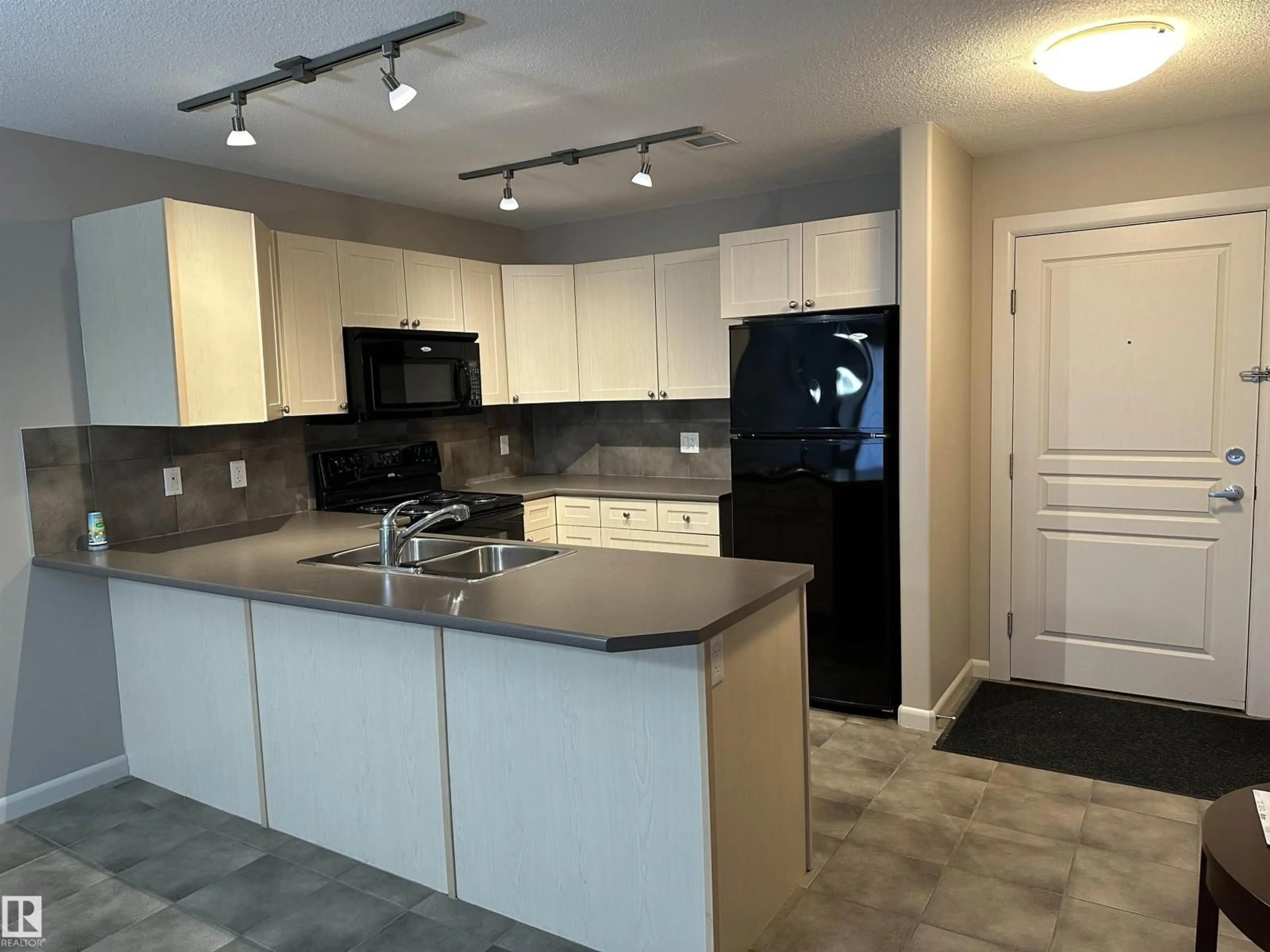 Open concept kitchen, unknown for 400 - 336 PALISADES WY, Sherwood Park Alberta T8H2T9
