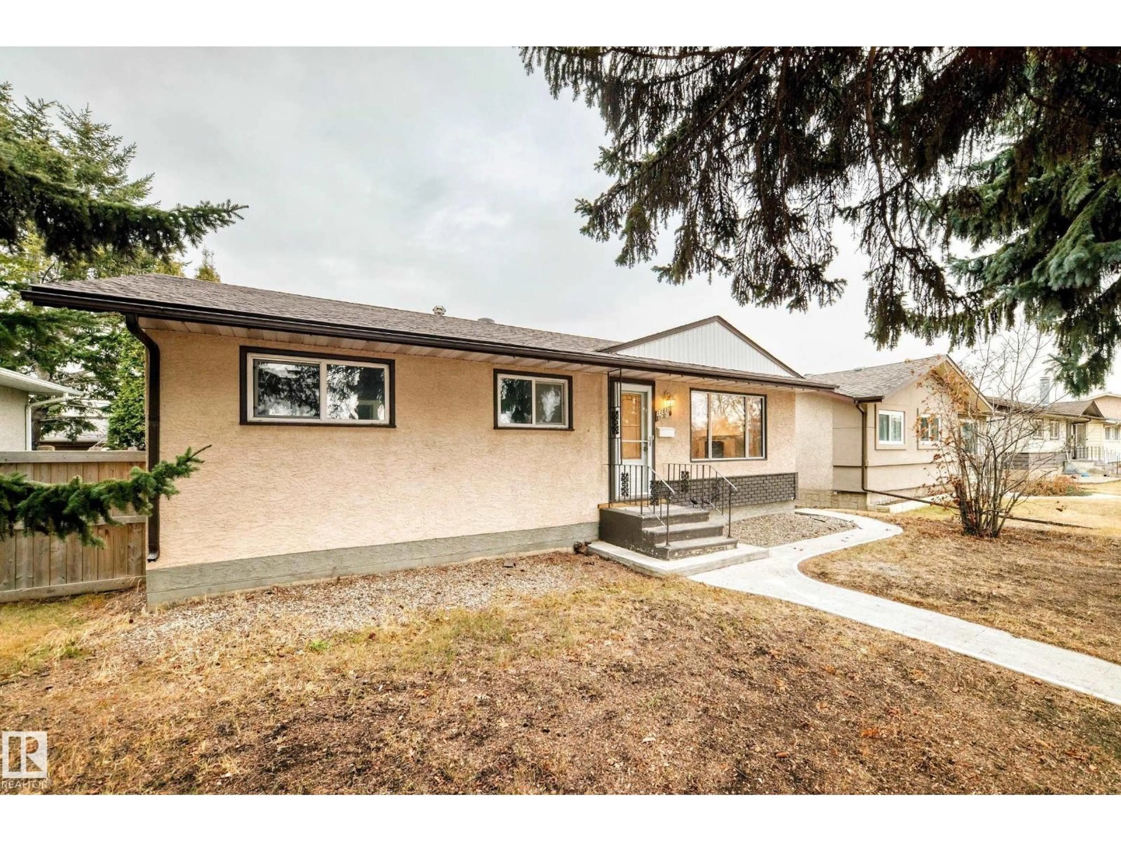 Home with vinyl exterior material, street for 12837 90 ST, Edmonton Alberta T5E3L7