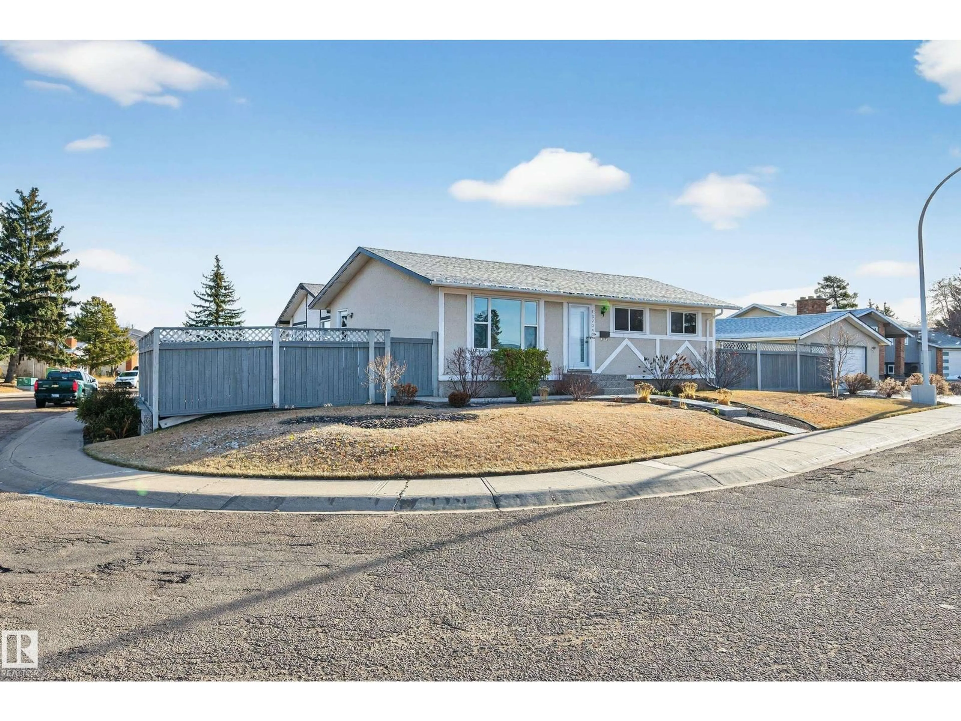 Home with vinyl exterior material, street for NW - 15231 119A ST, Edmonton Alberta T5X1K9