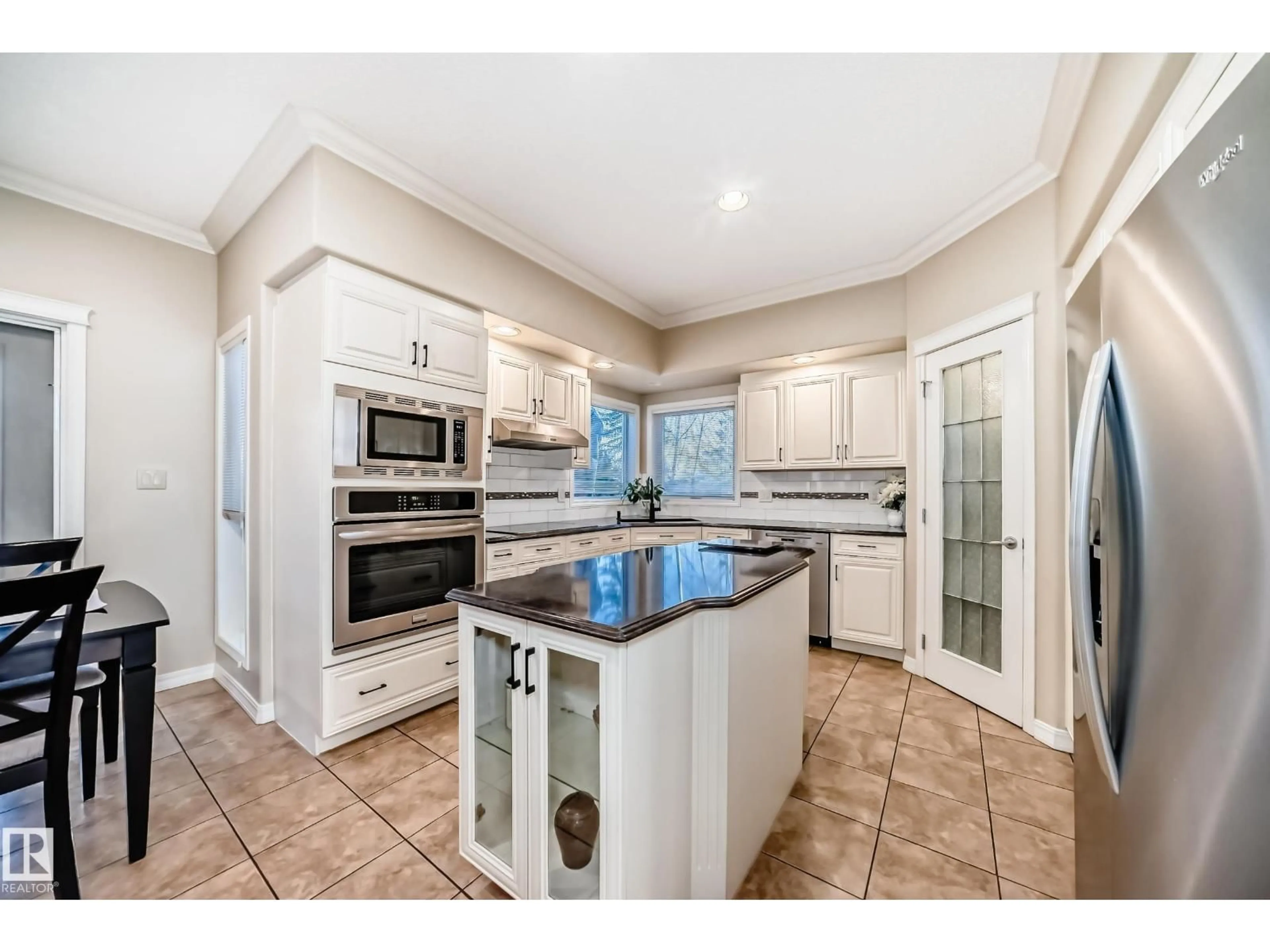 Open concept kitchen, ceramic/tile floor for 203 DARLINGTON CR, Edmonton Alberta T6M2T2