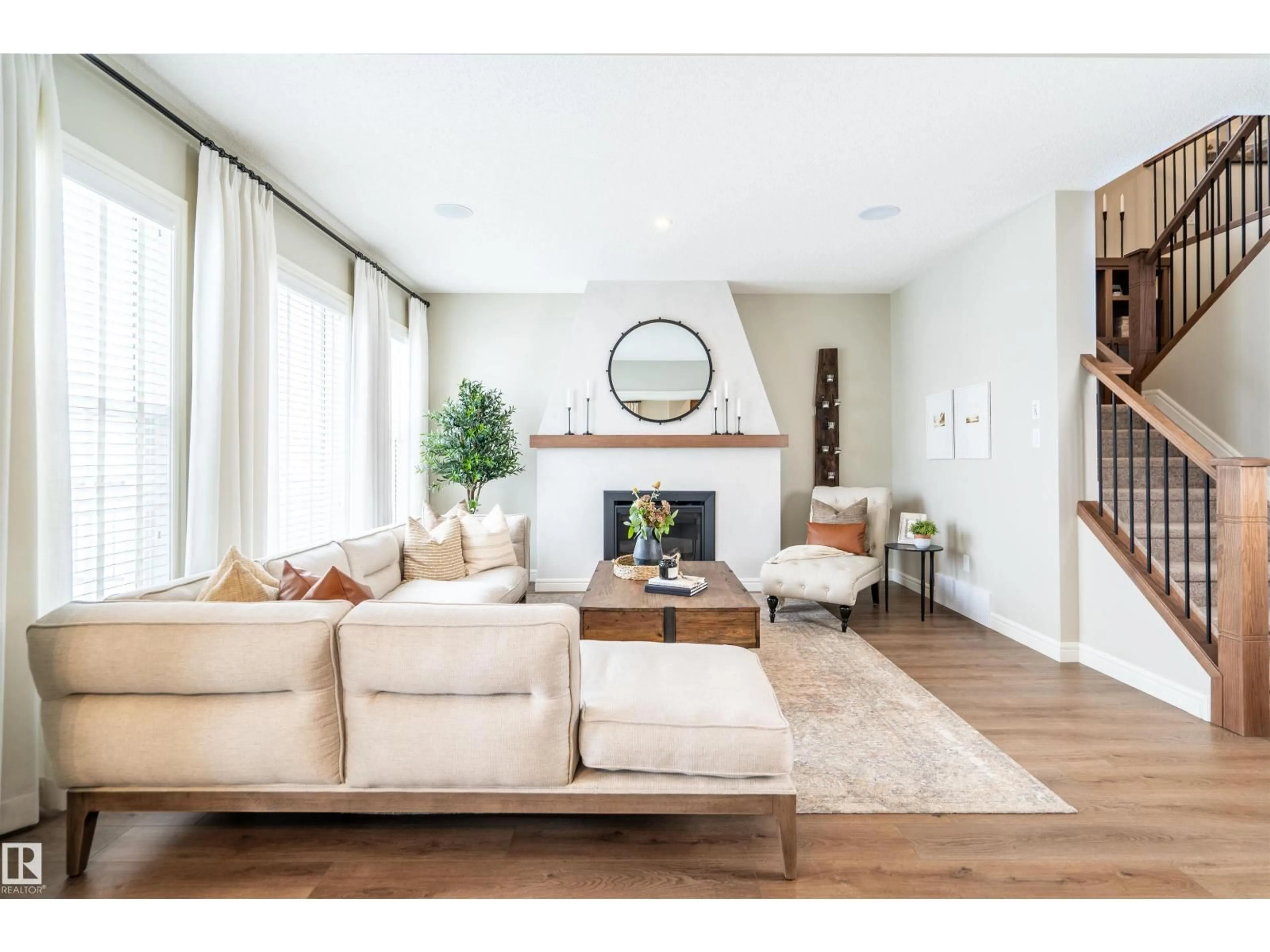 Living room with furniture, wood/laminate floor for NW - 1611 14 ST, Edmonton Alberta T6T2S2