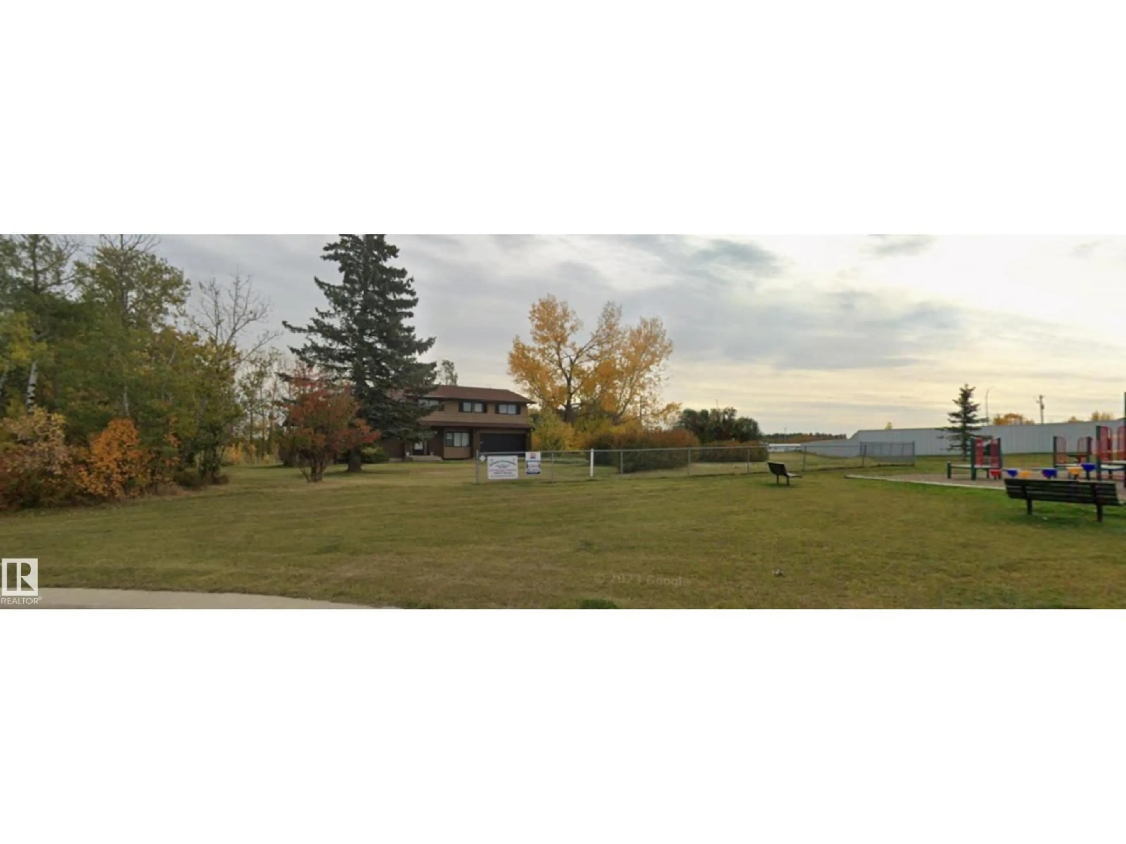 A pic from outside/outdoor area/front of a property/back of a property/a pic from drone, water/lake/river/ocean view for 4213 42 AV, Innisfail Alberta T4G1Y1