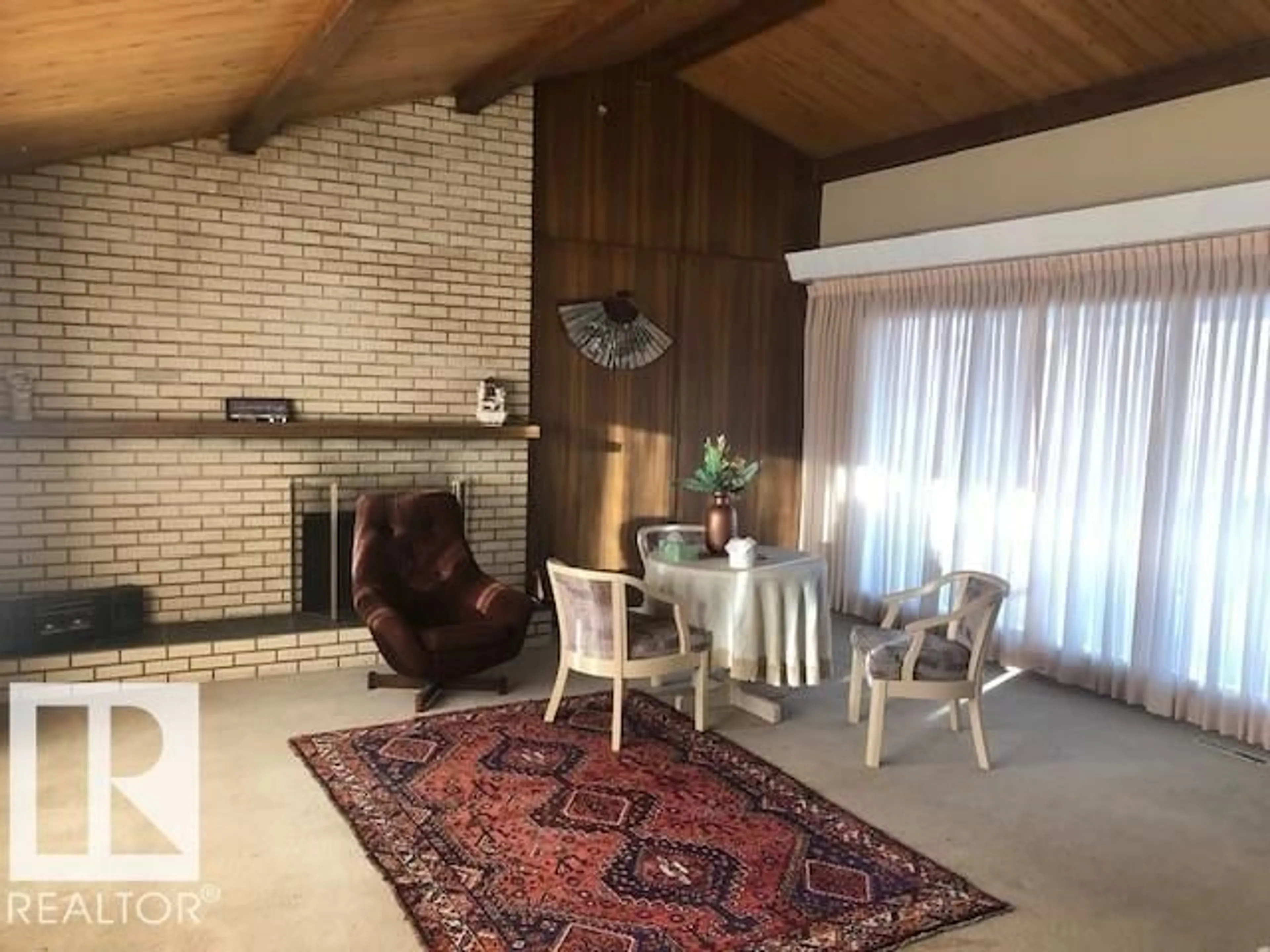 Living room with furniture, unknown for 4213 42 AV, Innisfail Alberta T4G1Y1