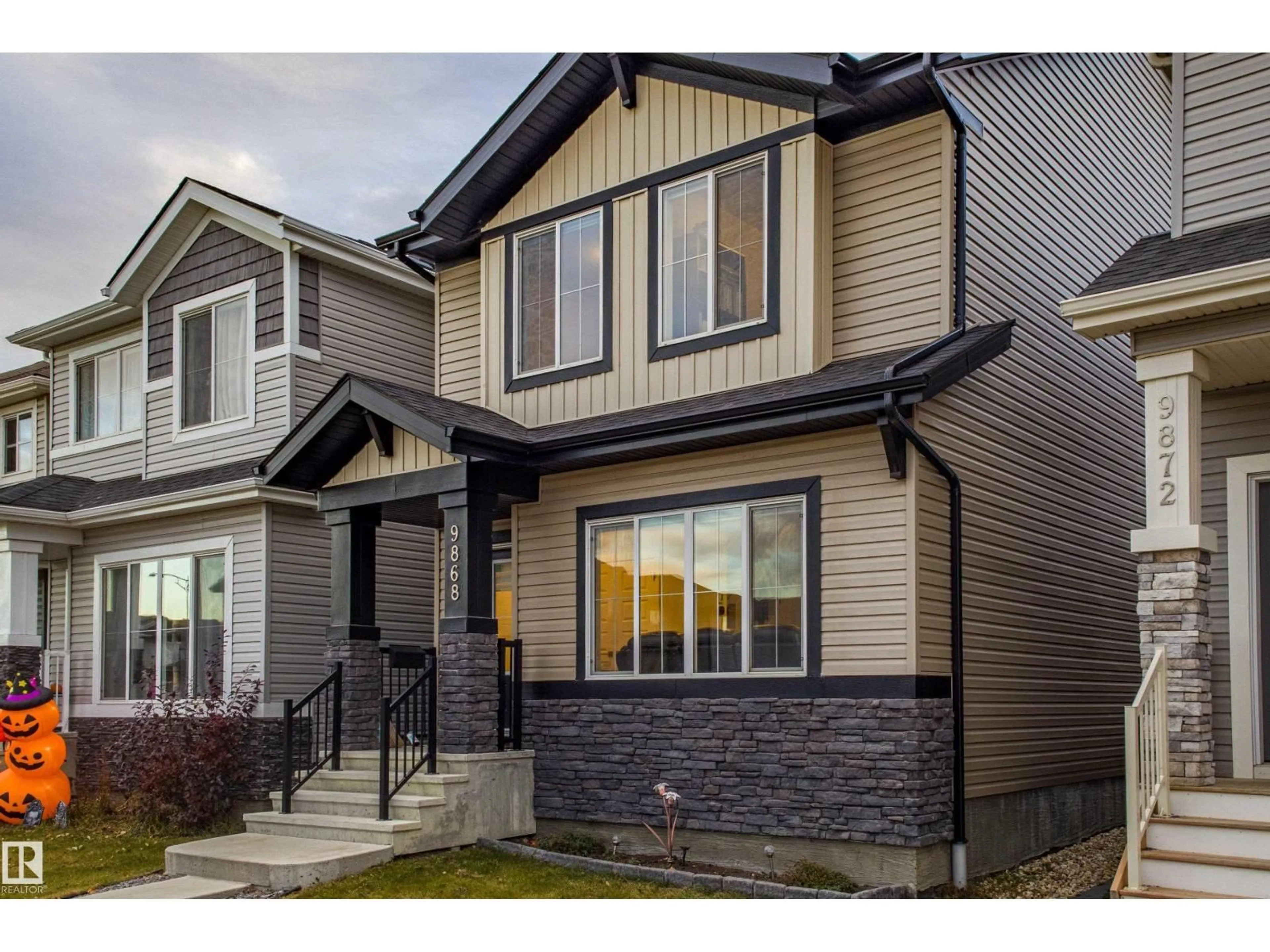 Home with vinyl exterior material, street for 9868 206 ST NW, Edmonton Alberta T5T7L5