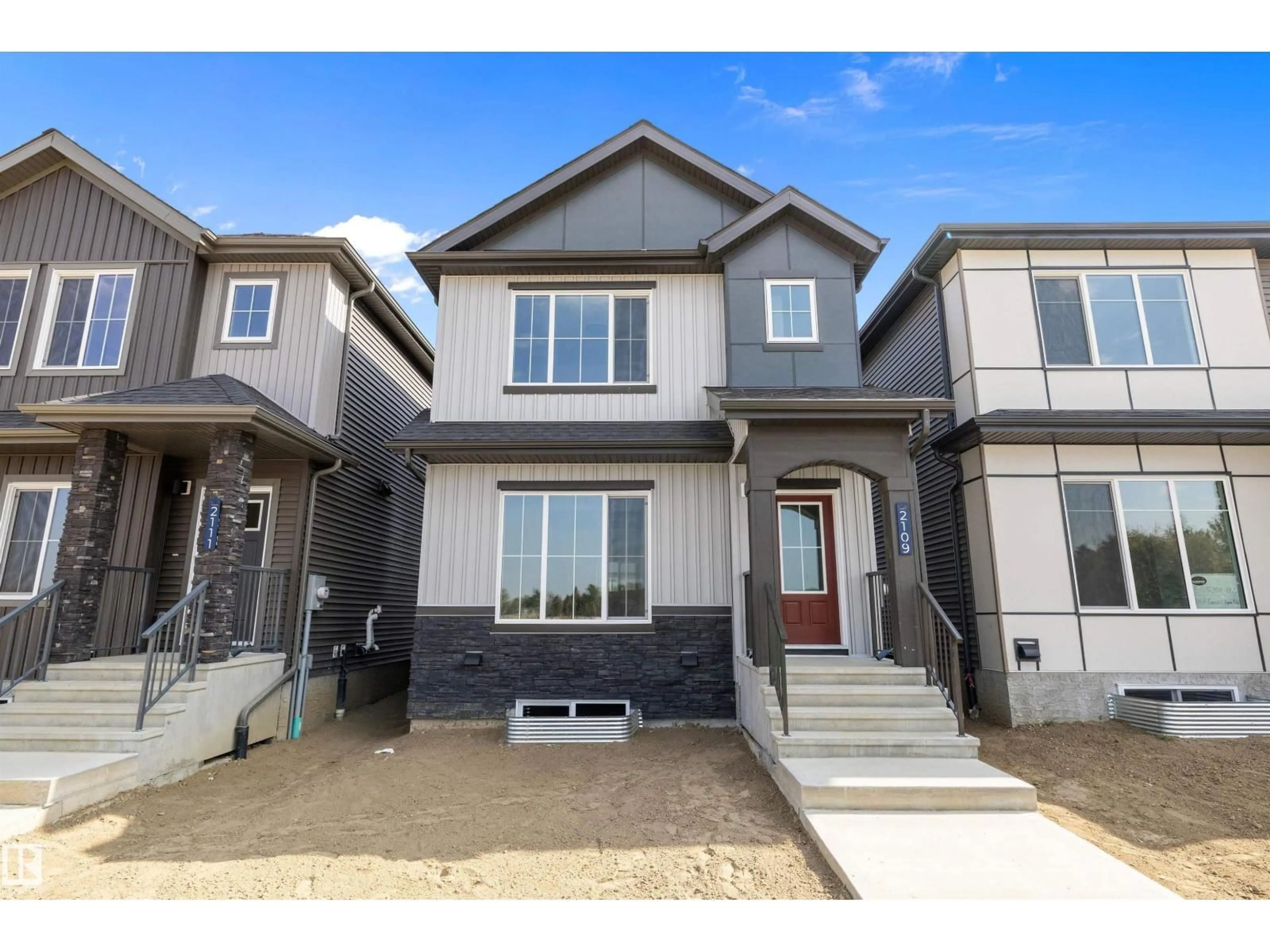 Home with vinyl exterior material, street for 2109 CROSSBILL LN, Edmonton Alberta T5S0W3