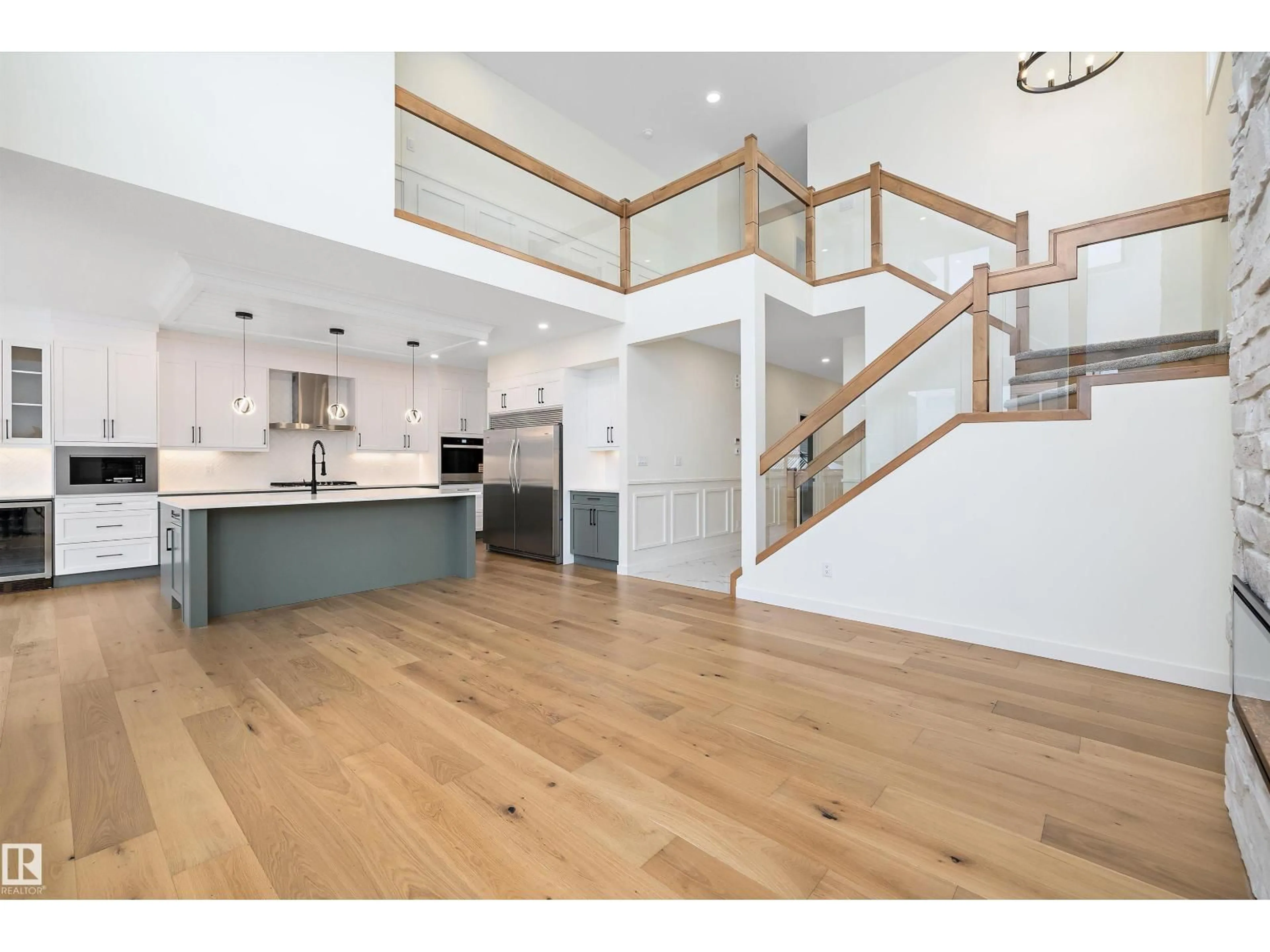 Open concept kitchen, wood/laminate floor for 6879 KNOX LO SW, Edmonton Alberta T6W4R4