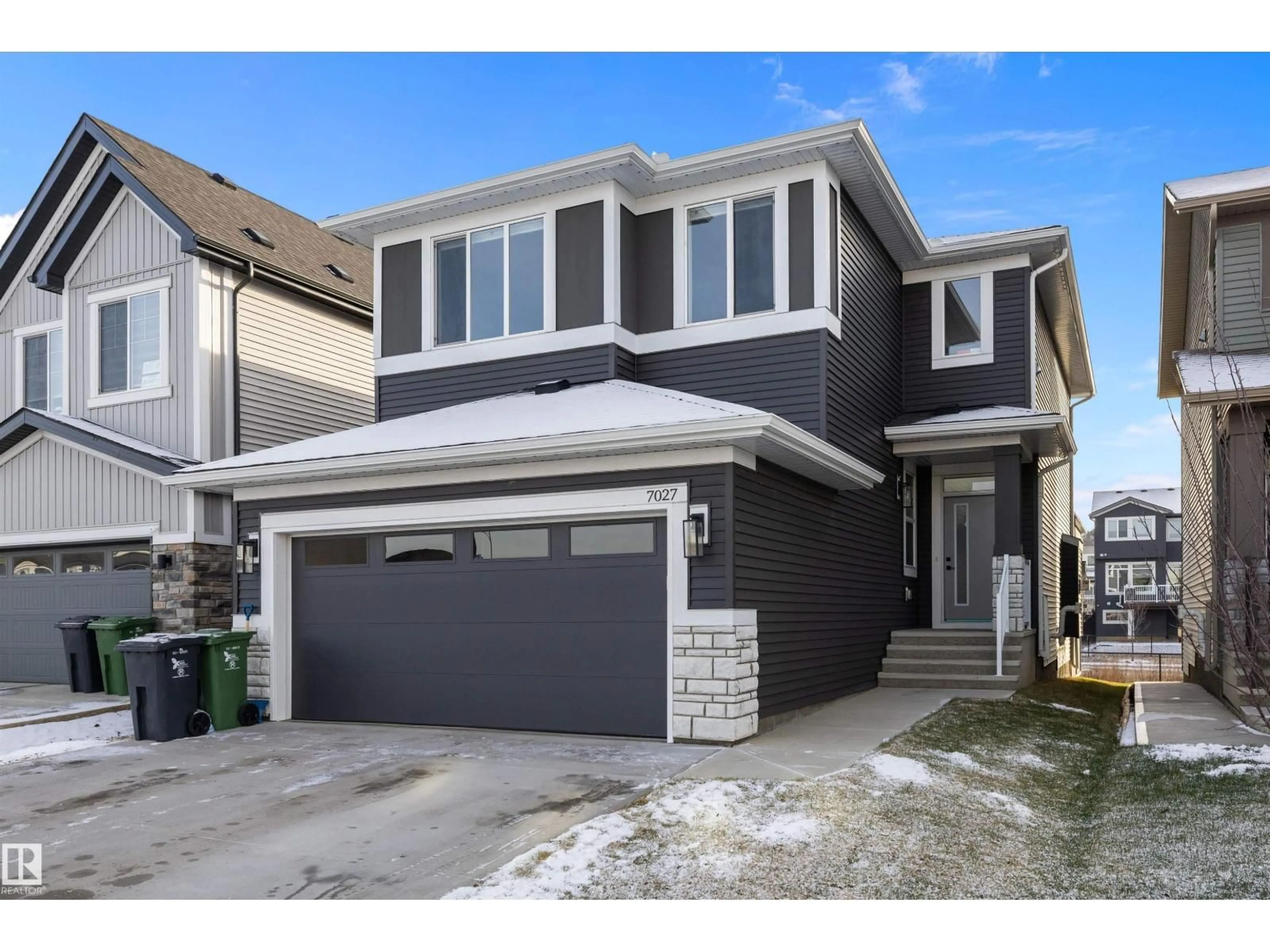 Home with vinyl exterior material, street for 7027 54 AV, Beaumont Alberta T4X2Z9