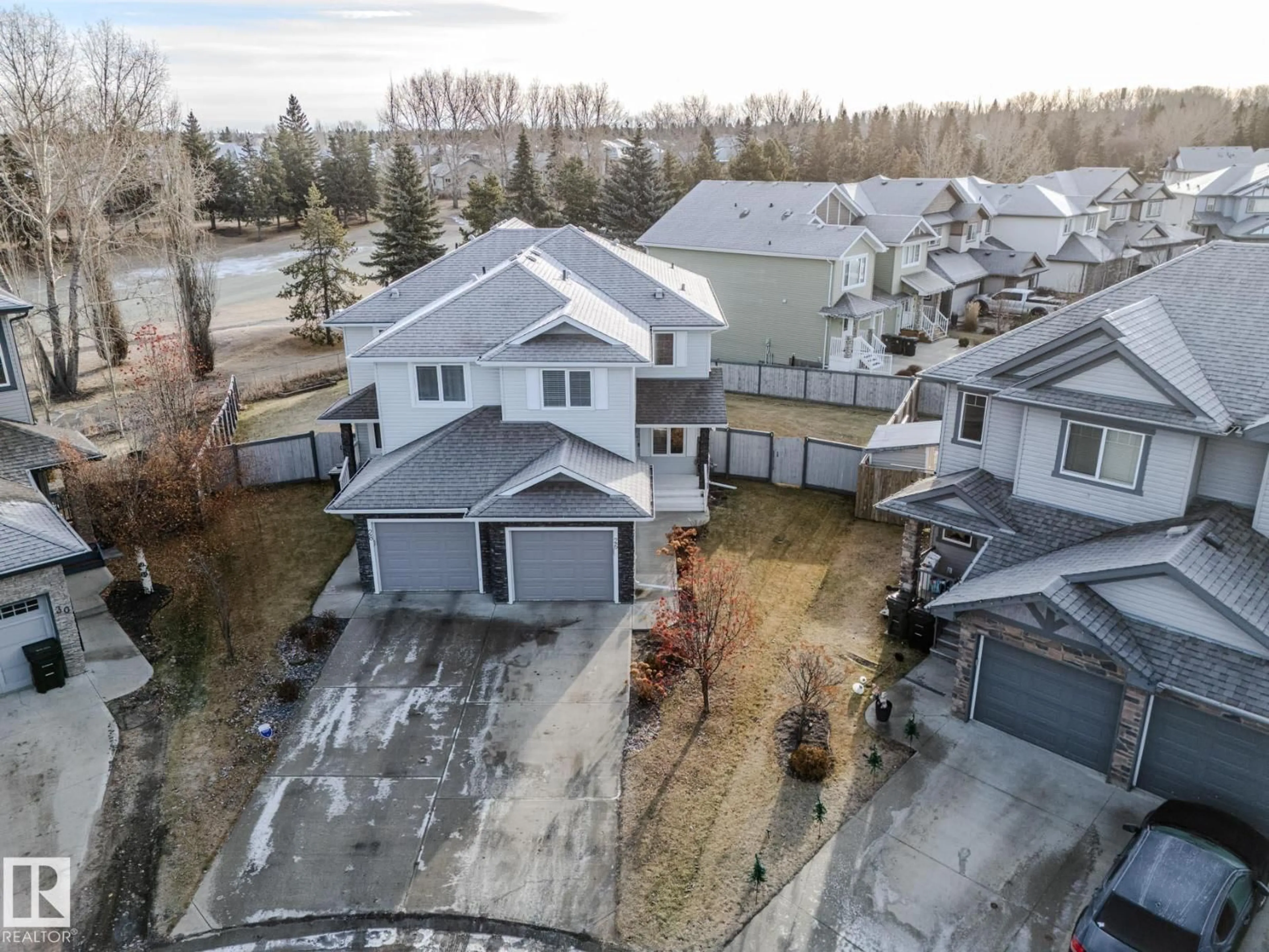 A pic from outside/outdoor area/front of a property/back of a property/a pic from drone, street for 26 AUSTIN CT, Spruce Grove Alberta T7X0N4