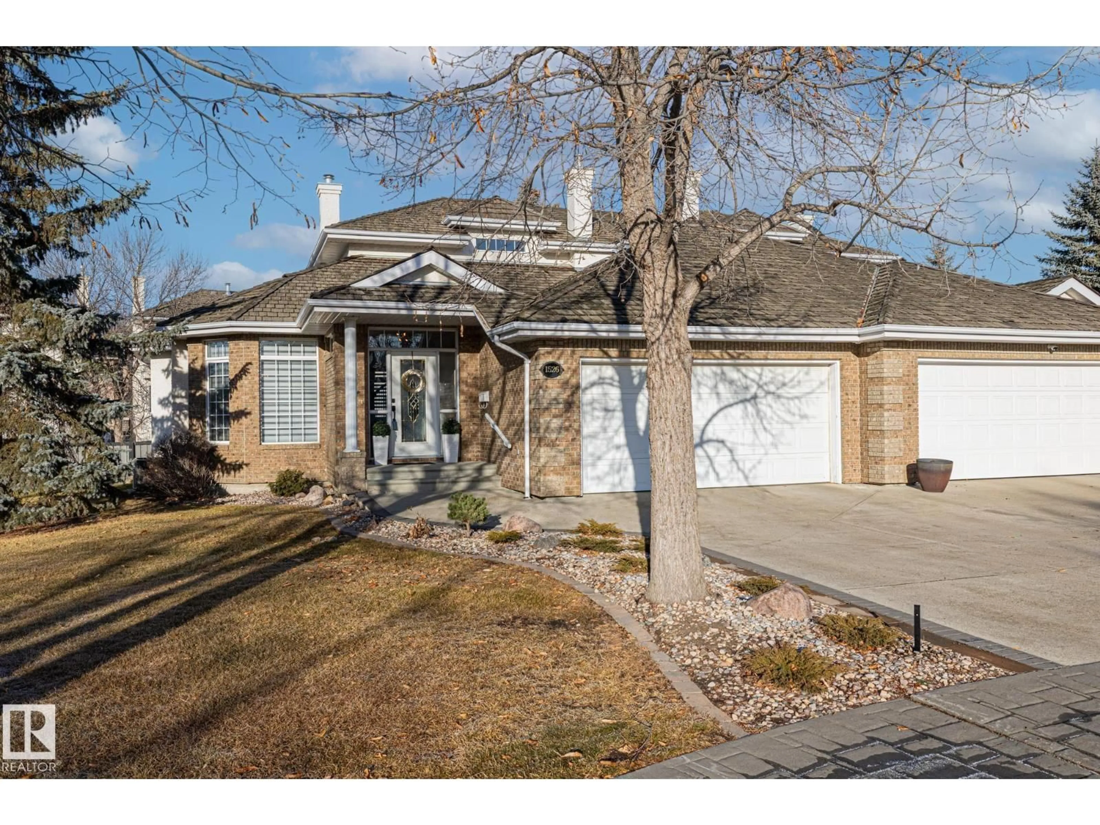 Home with brick exterior material, street for 1526 HEFFERNAN CL, Edmonton Alberta T6R2N7