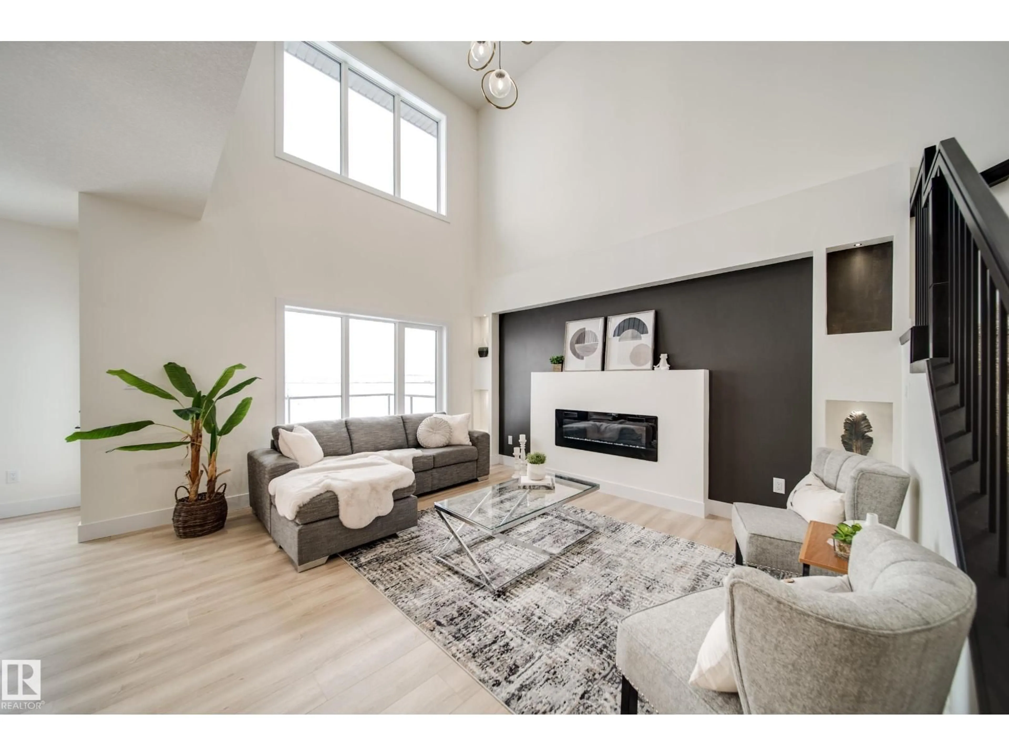 Living room with furniture, unknown for NW - 7156 177 AV, Edmonton Alberta T5Z0W9