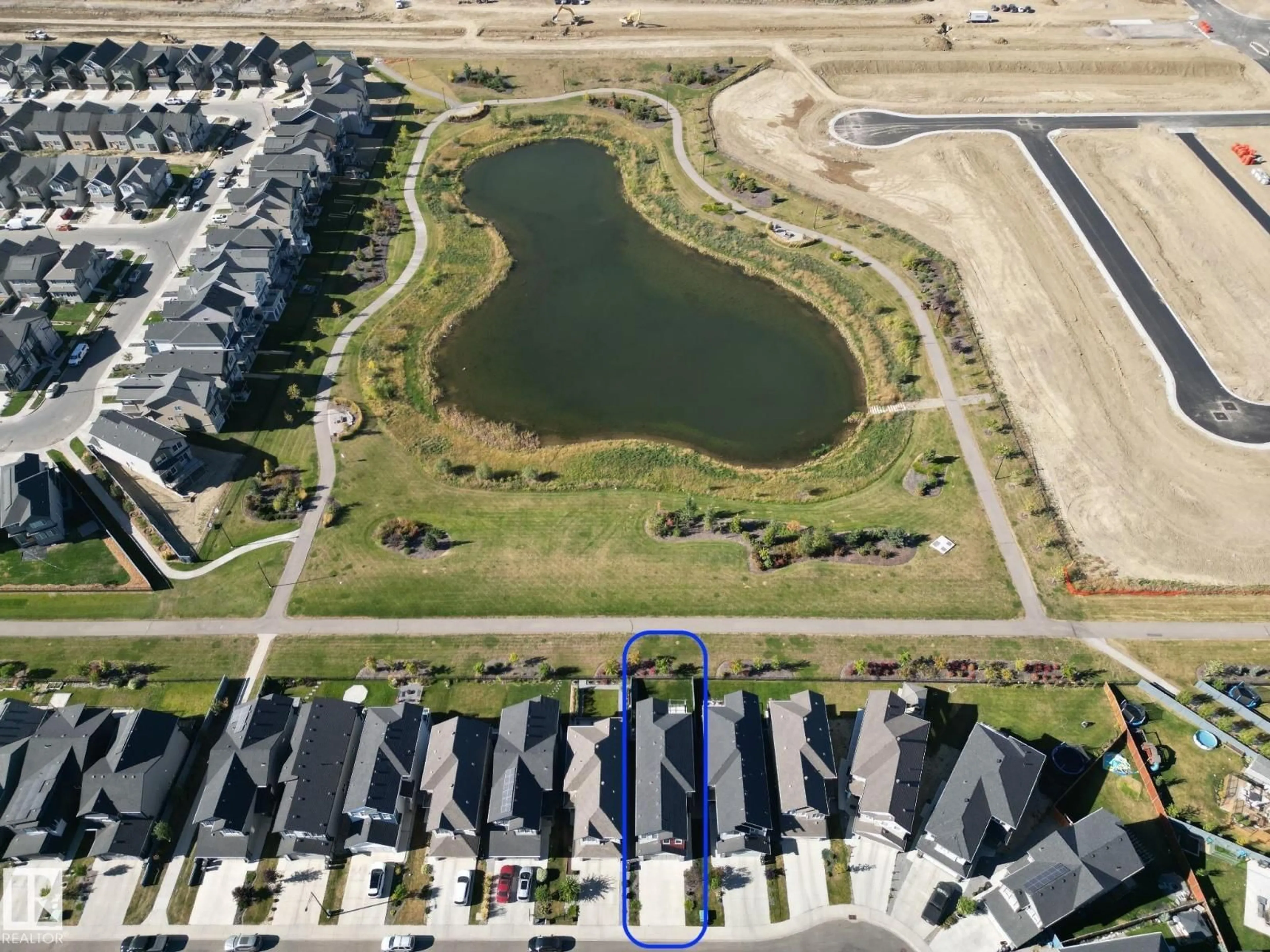A pic from outside/outdoor area/front of a property/back of a property/a pic from drone, water/lake/river/ocean view for 2654 DONAGHEY CR, Edmonton Alberta T6W4T1