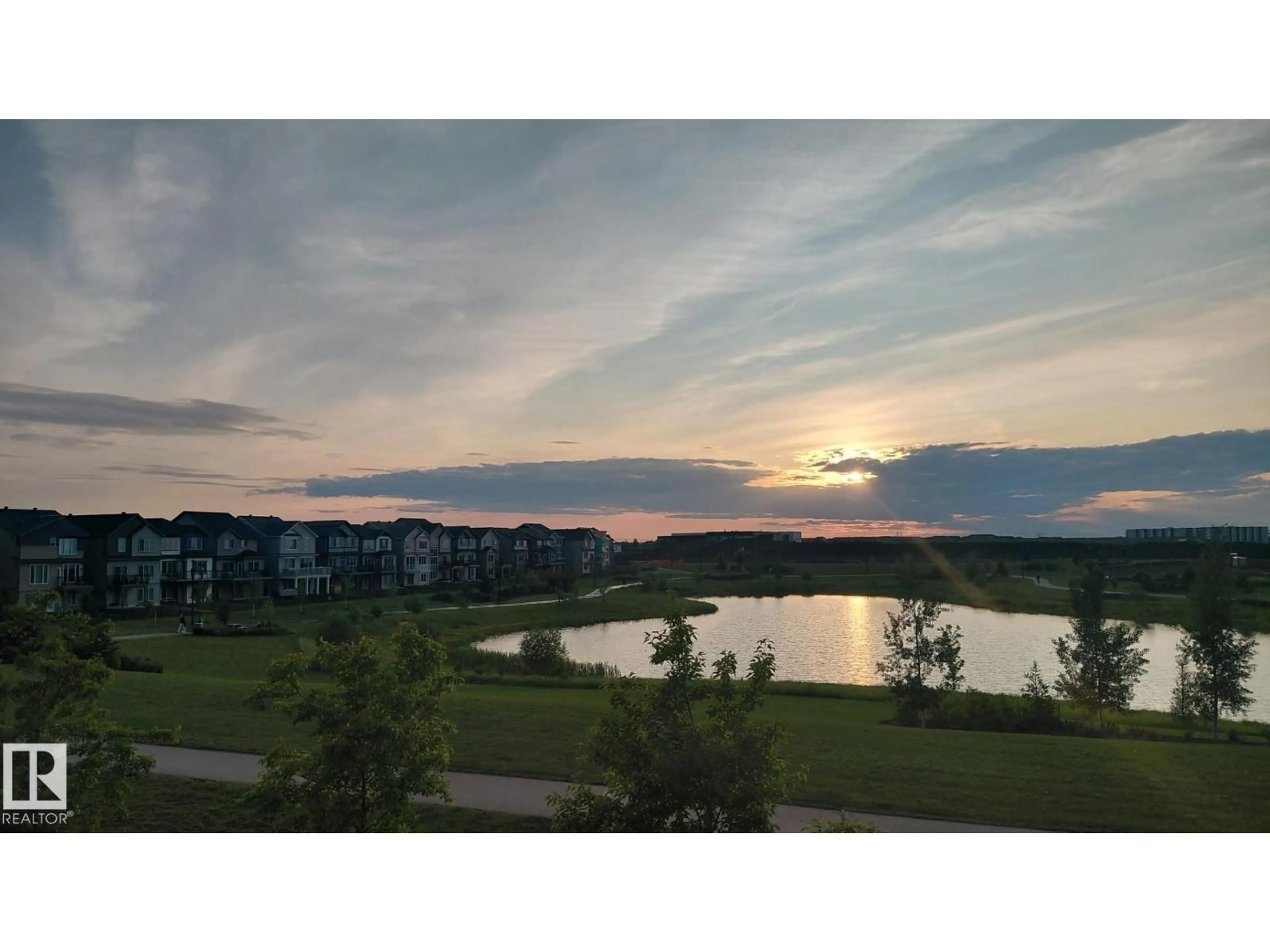 A pic from outside/outdoor area/front of a property/back of a property/a pic from drone, water/lake/river/ocean view for 2654 DONAGHEY CR, Edmonton Alberta T6W4T1