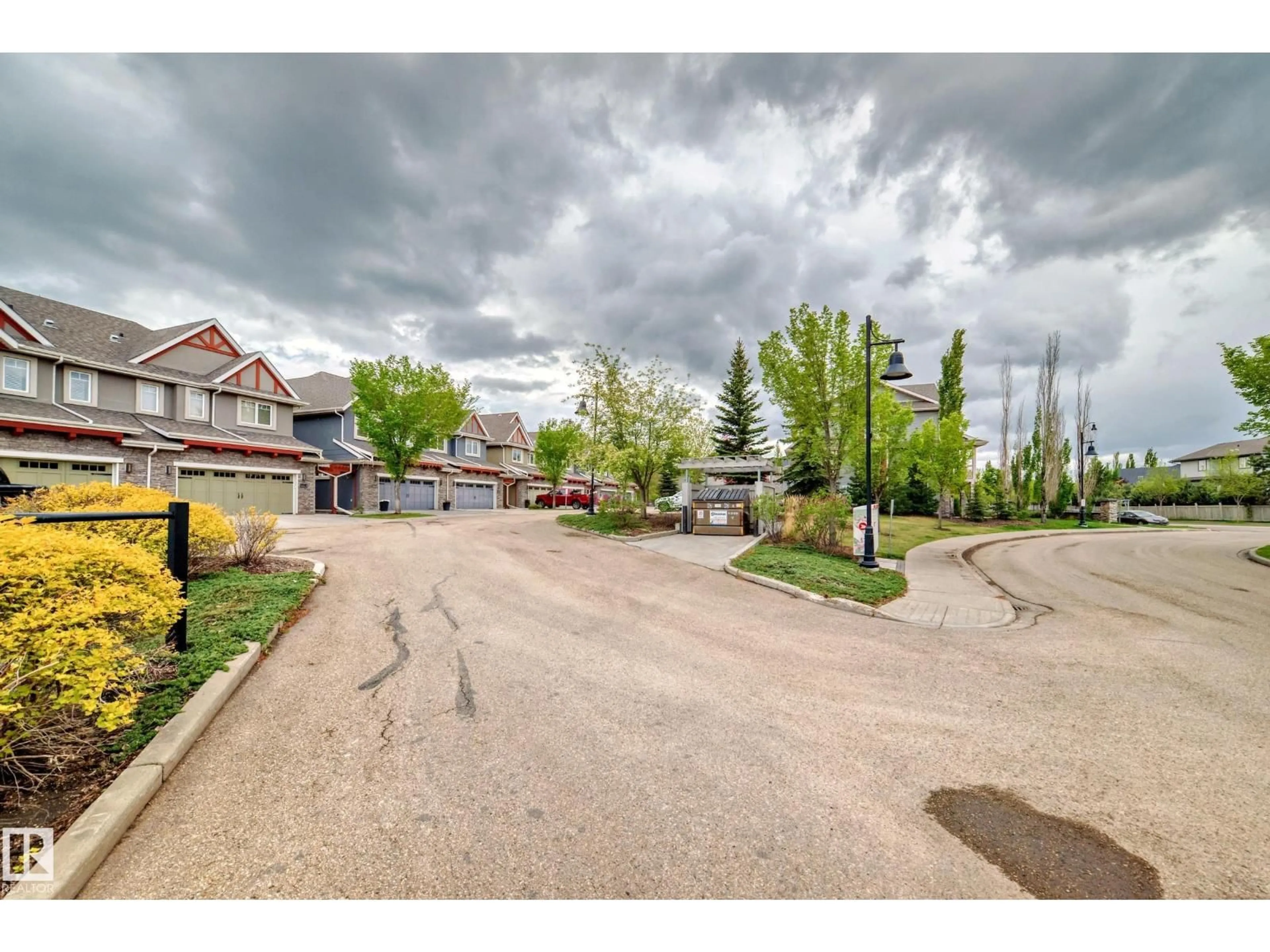 A pic from outside/outdoor area/front of a property/back of a property/a pic from drone, street for 1673 JAMES MOWATT TR, Edmonton Alberta T6W0J7