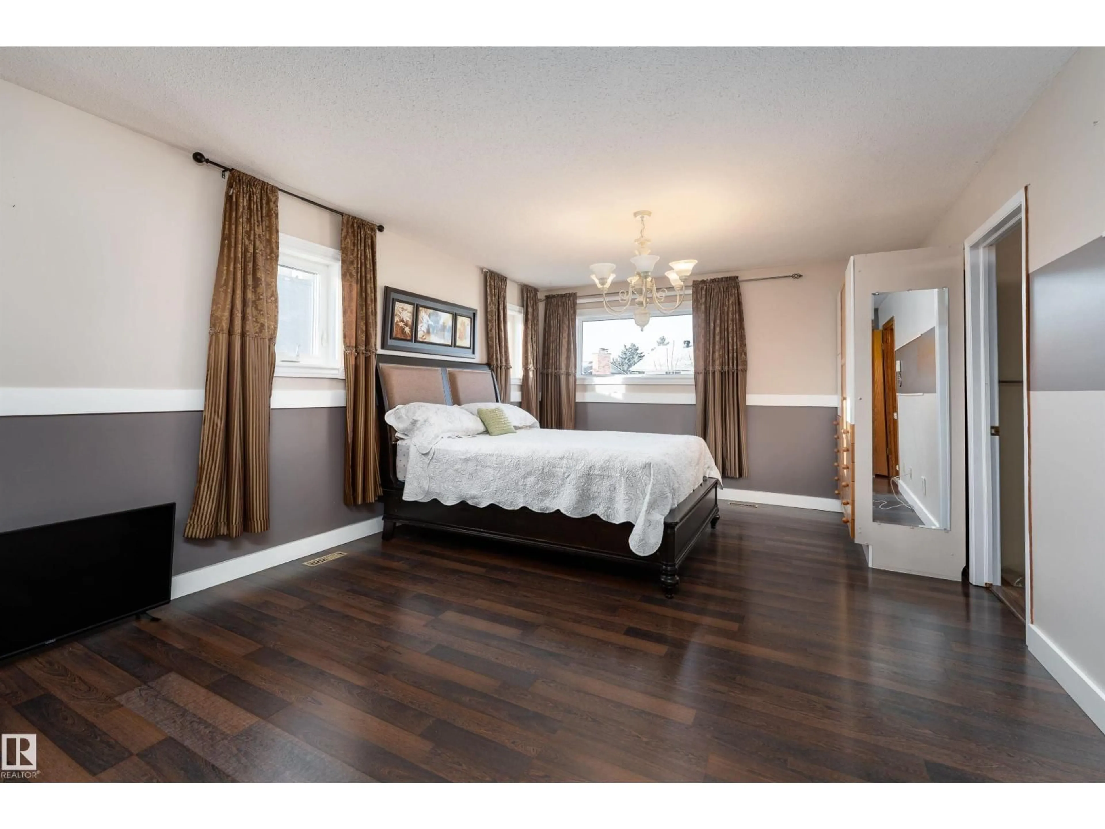 Bedroom with bed, wood/laminate floor for 16108 109 ST, Edmonton Alberta T5E3V8