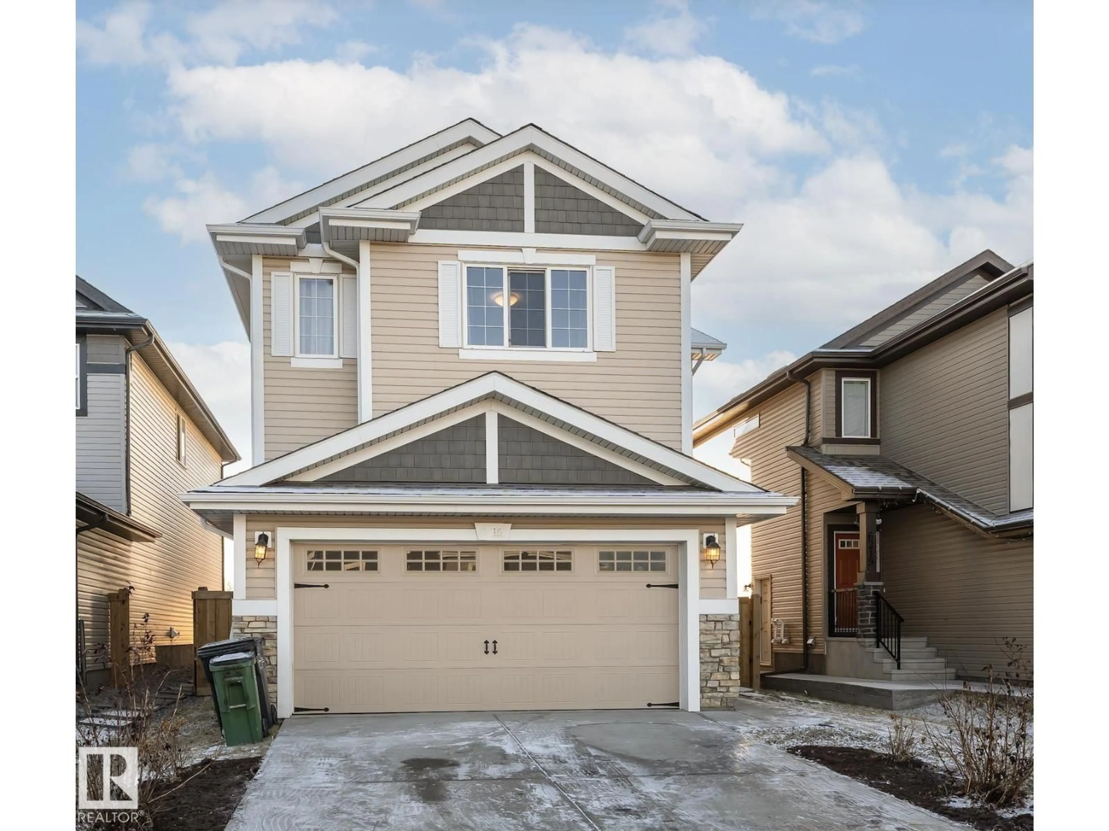 Home with vinyl exterior material, street for NW - 6215 179 AV, Edmonton Alberta T5Y3Z4