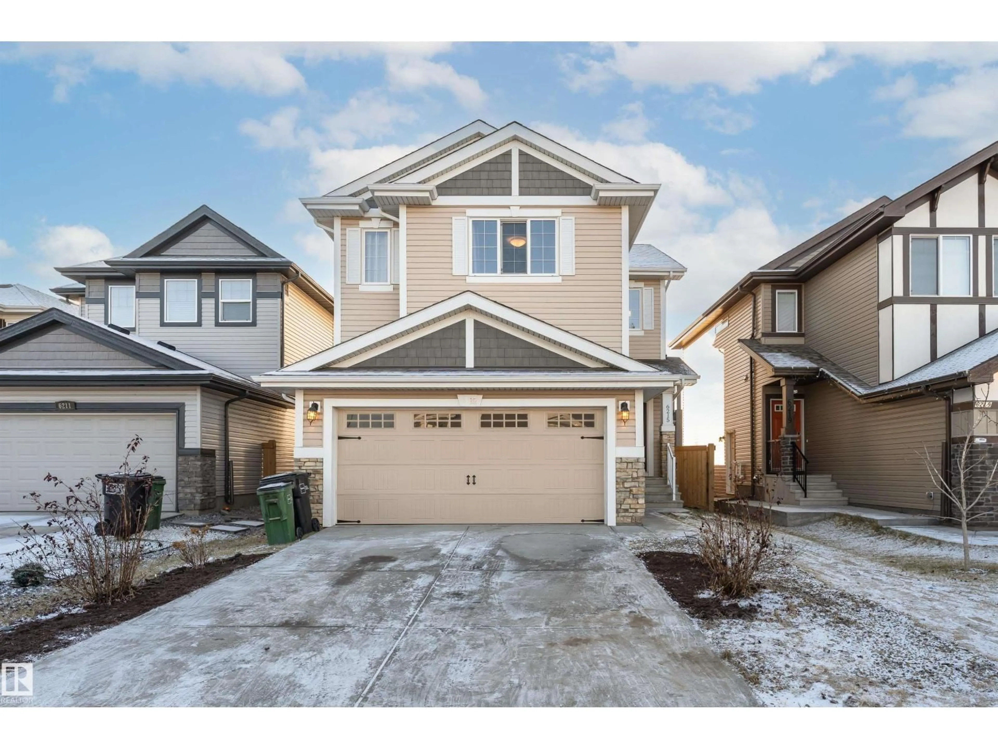 Home with vinyl exterior material, street for NW - 6215 179 AV, Edmonton Alberta T5Y3Z4