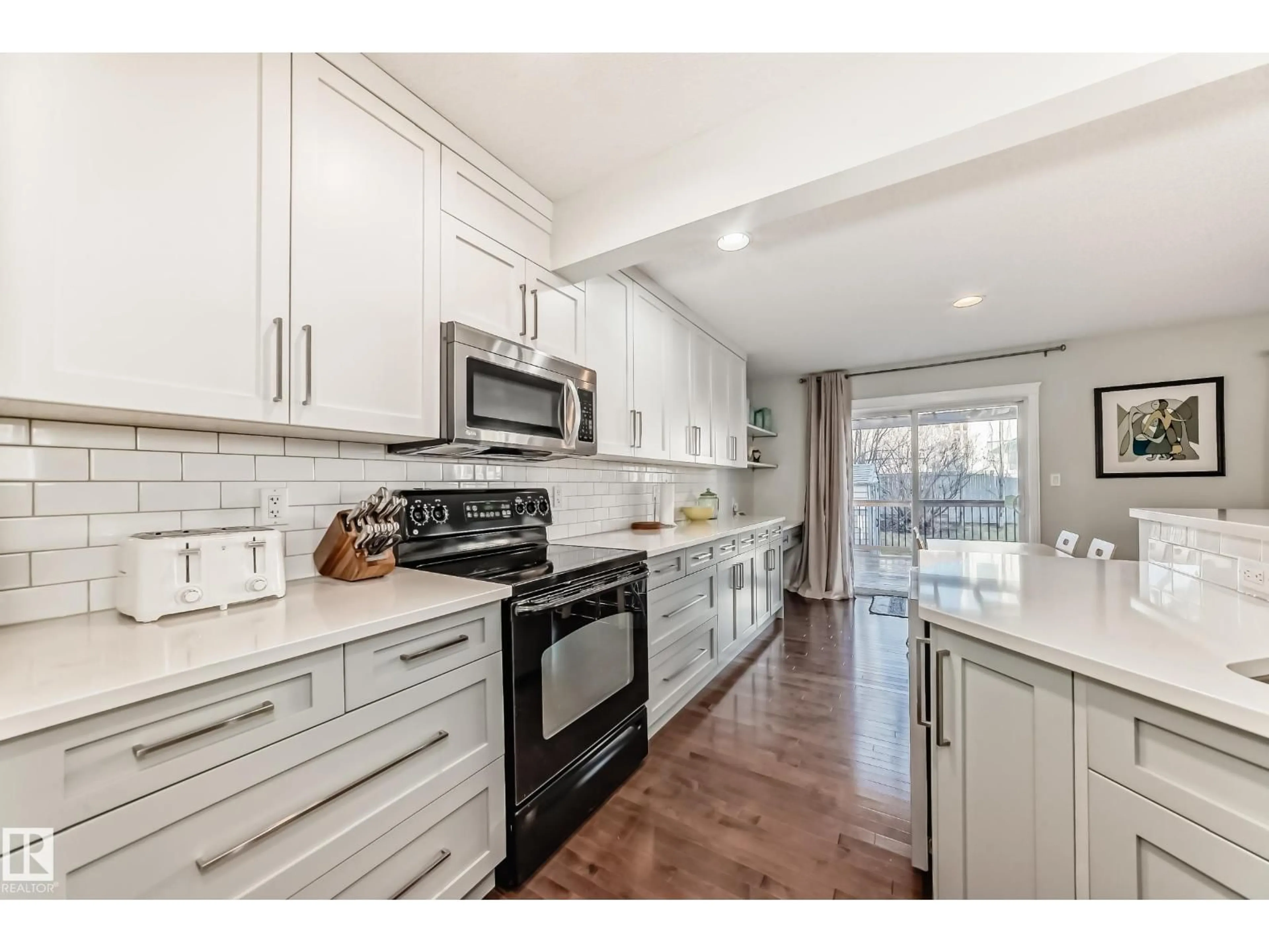 Open concept kitchen, ceramic/tile floor for 20448 56 AV, Edmonton Alberta T6M0B8