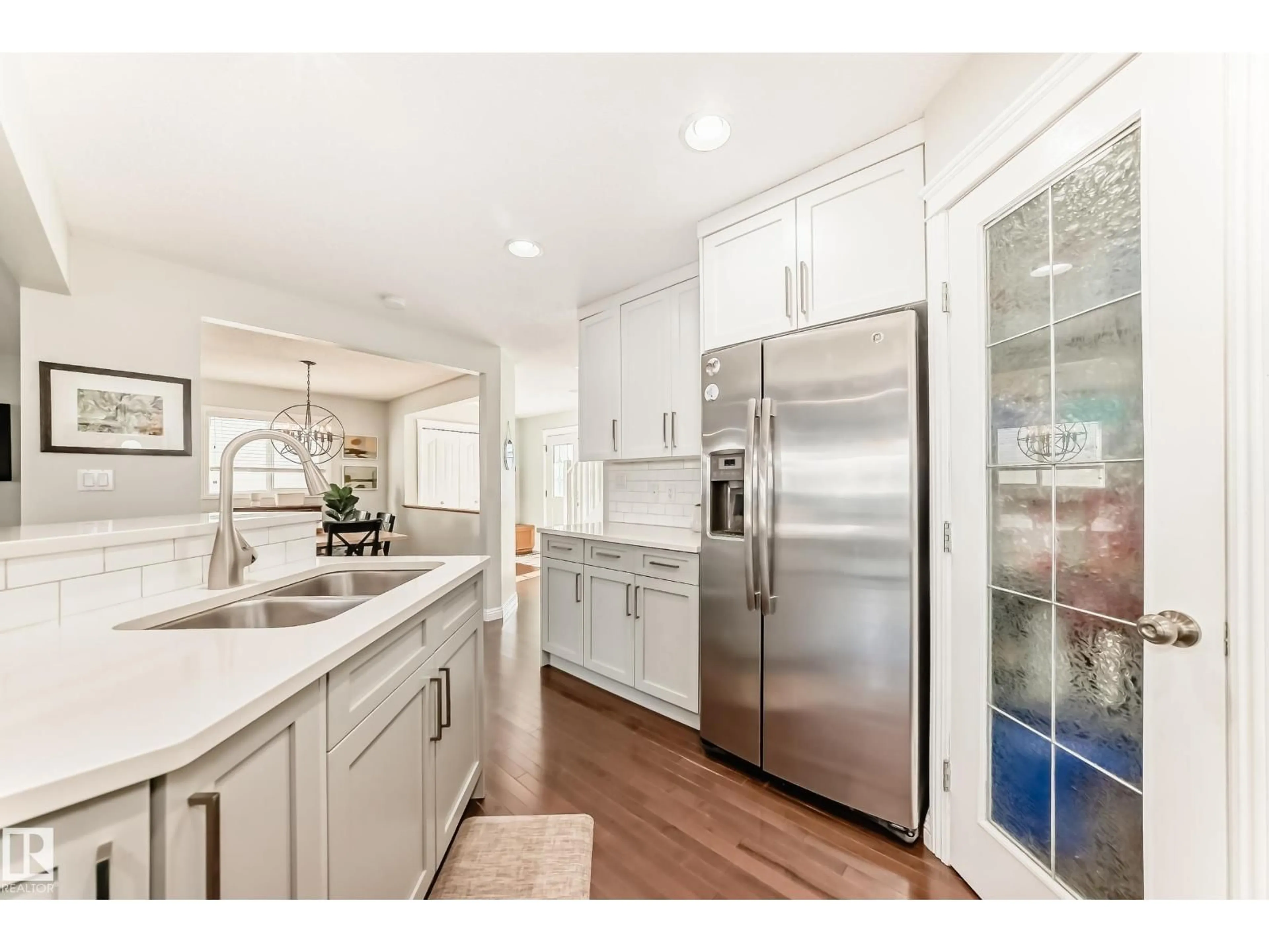 Open concept kitchen, ceramic/tile floor for 20448 56 AV, Edmonton Alberta T6M0B8