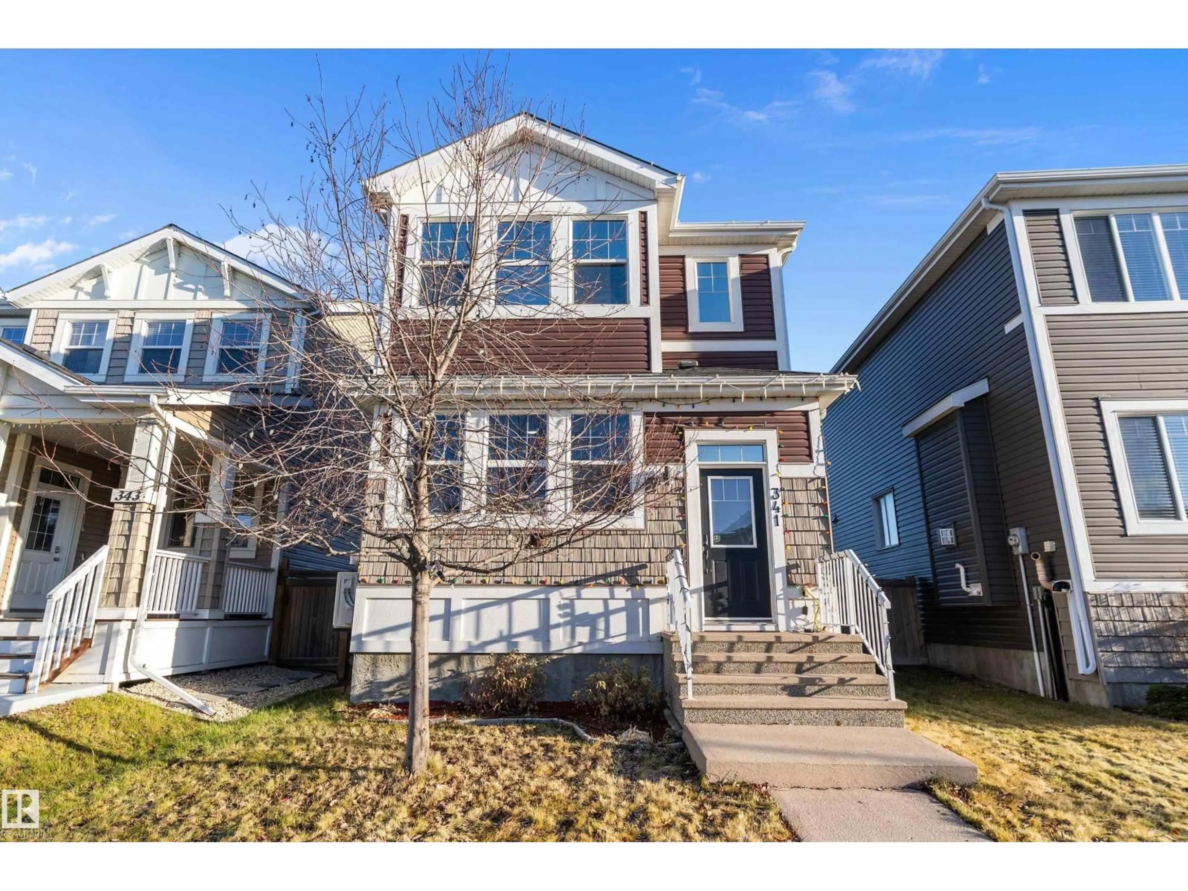 Home with vinyl exterior material, street for 341 SOUTHFORK DR, Leduc Alberta T9E0T8