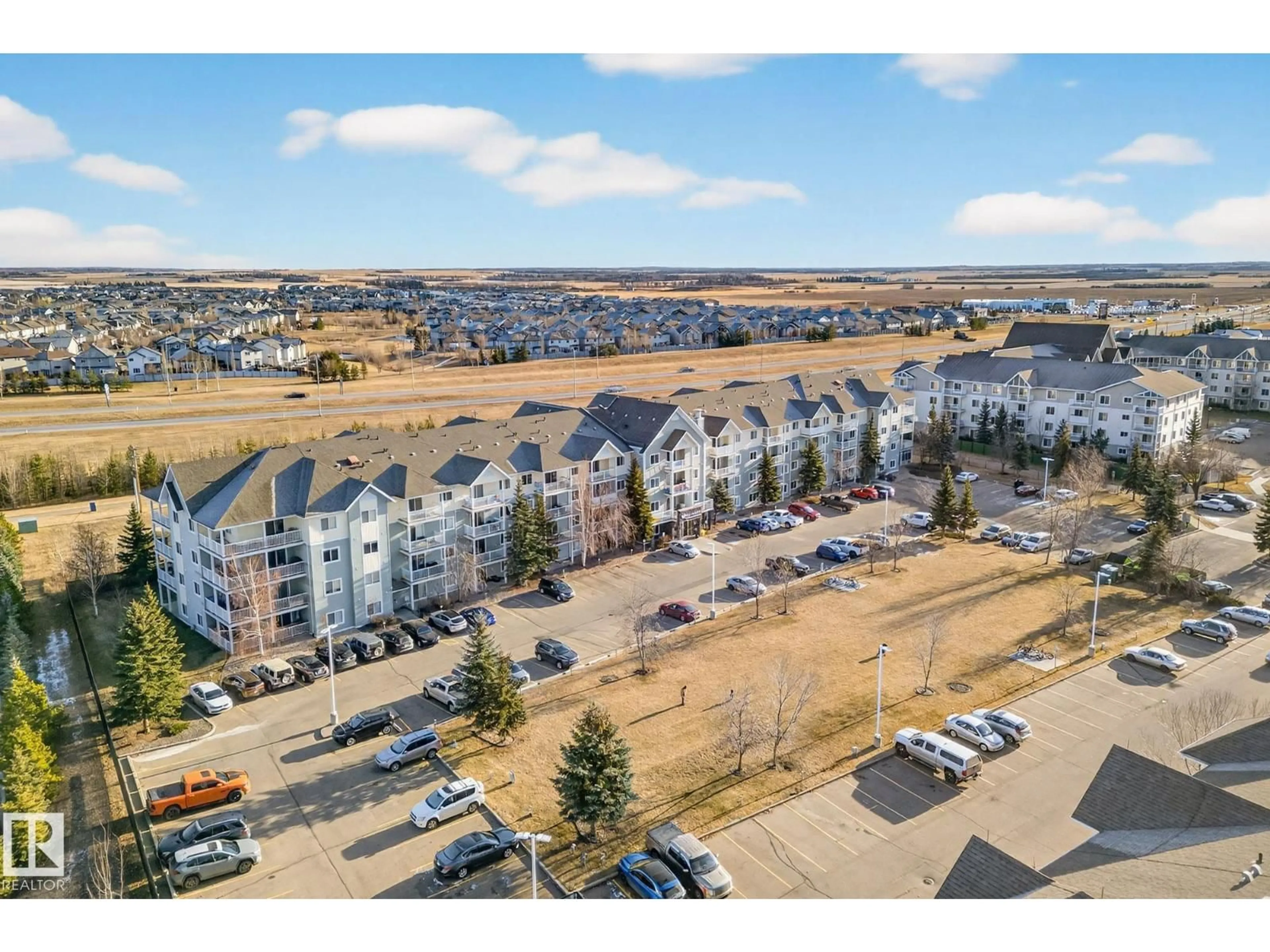 A pic from outside/outdoor area/front of a property/back of a property/a pic from drone, unknown for 70 - 309 WOODSMERE, Fort Saskatchewan Alberta T8L4R8