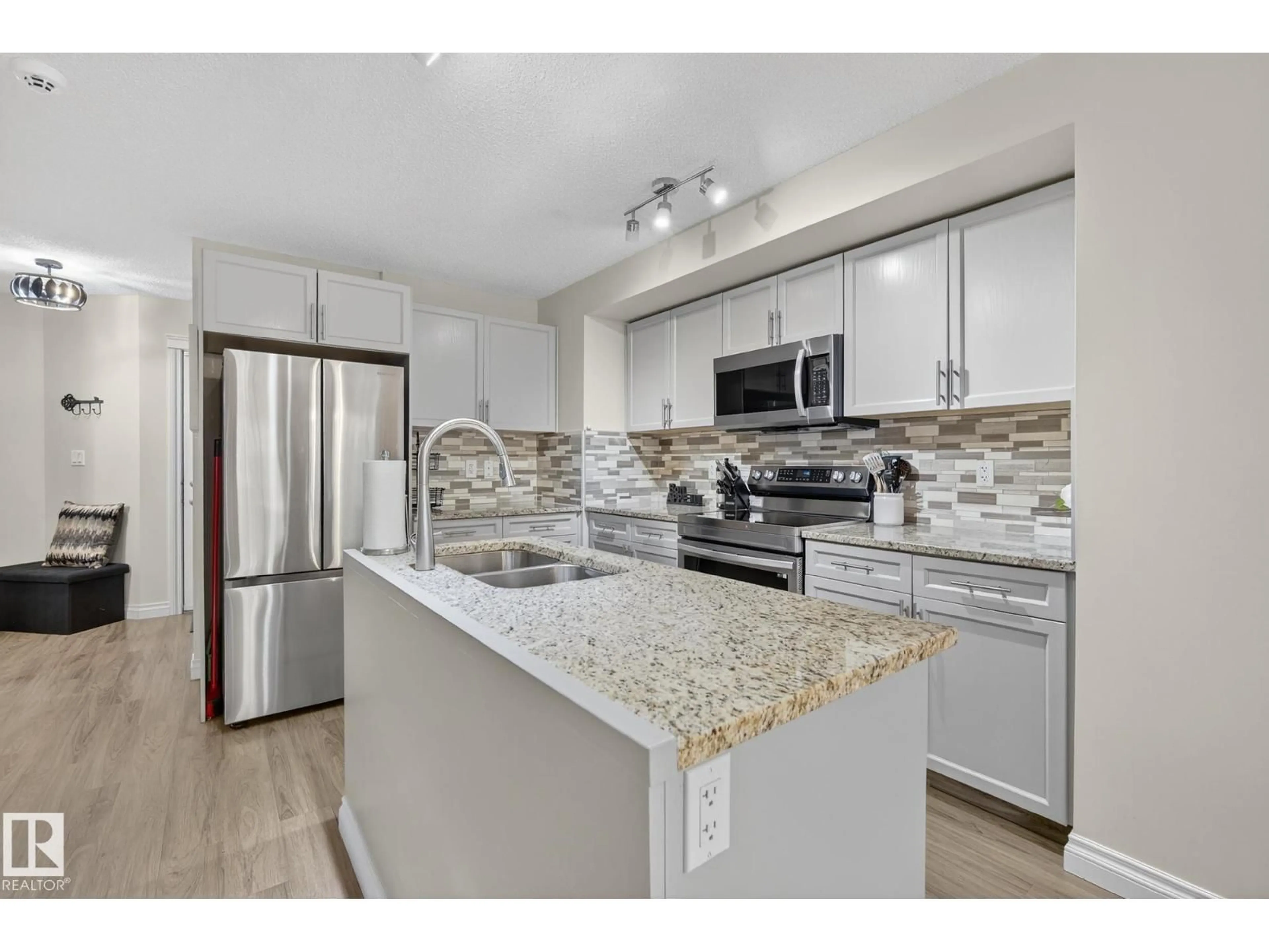 Open concept kitchen, ceramic/tile floor for 64 HAMILTON CO, Spruce Grove Alberta T7X0K4