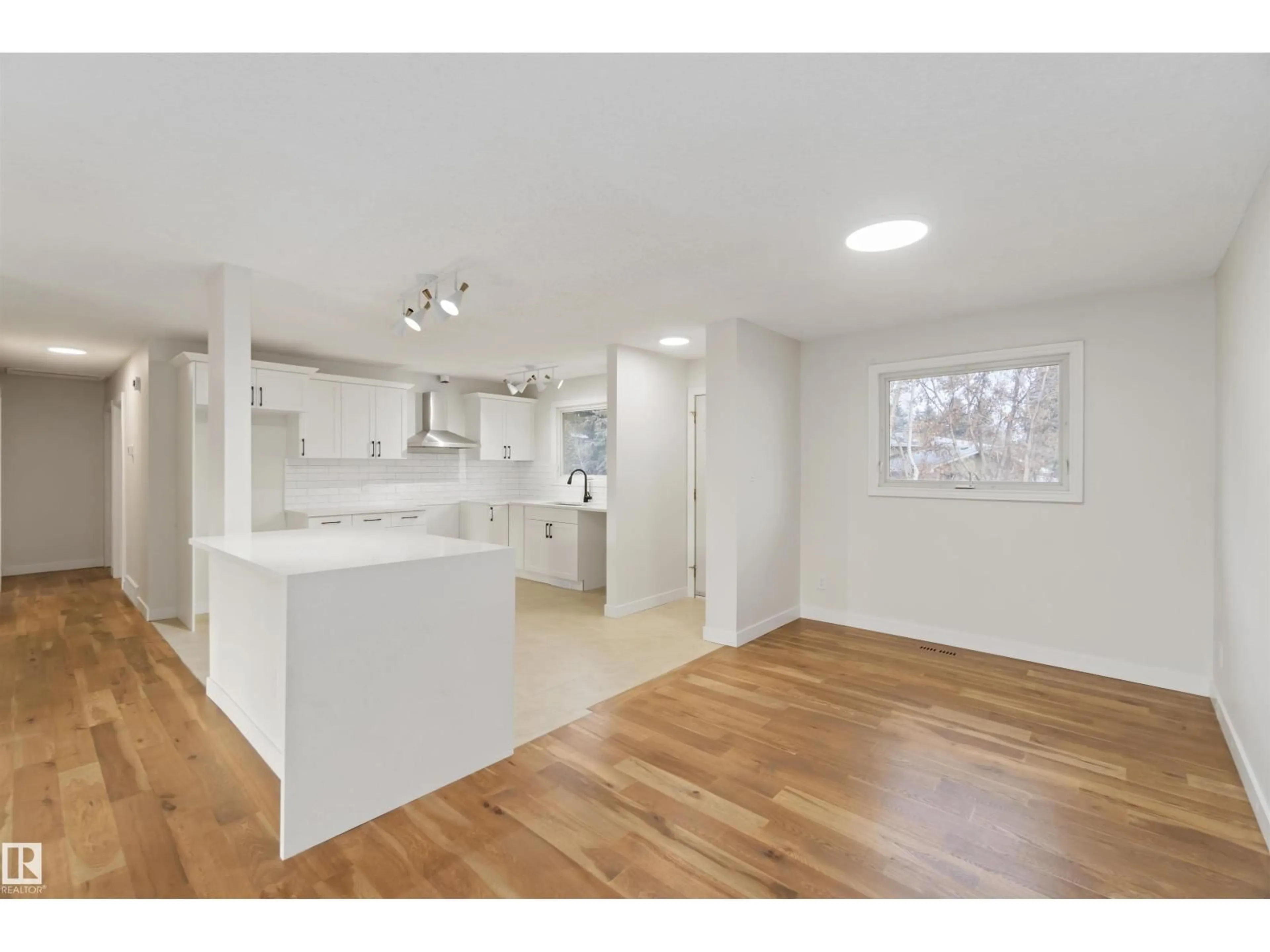 Open concept kitchen, wood/laminate floor for 14 GOODRIDGE DR, St. Albert Alberta T8N2A8