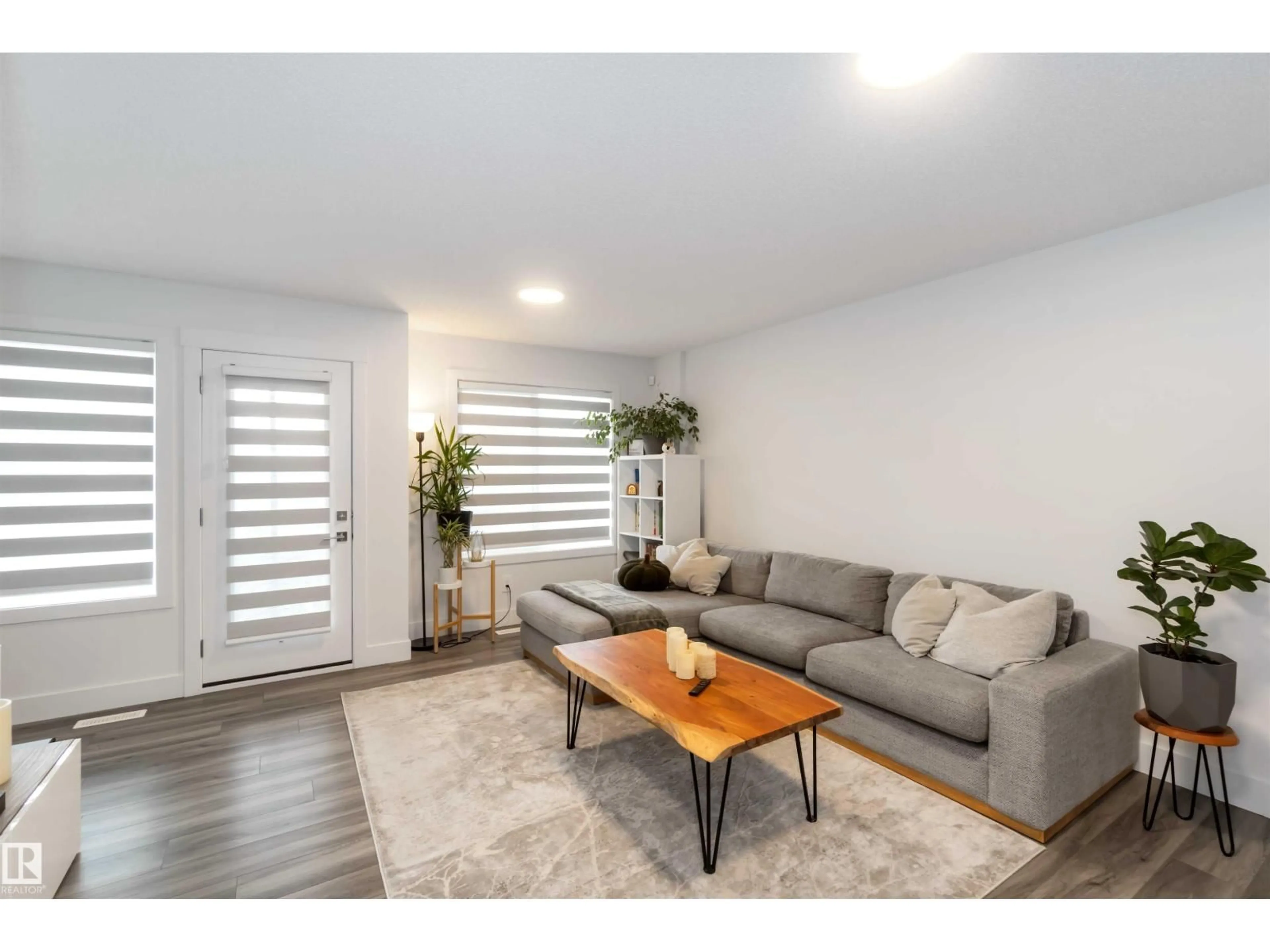 Living room with furniture, wood/laminate floor for #16 - 16335 84 ST, Edmonton Alberta T5Z0S1