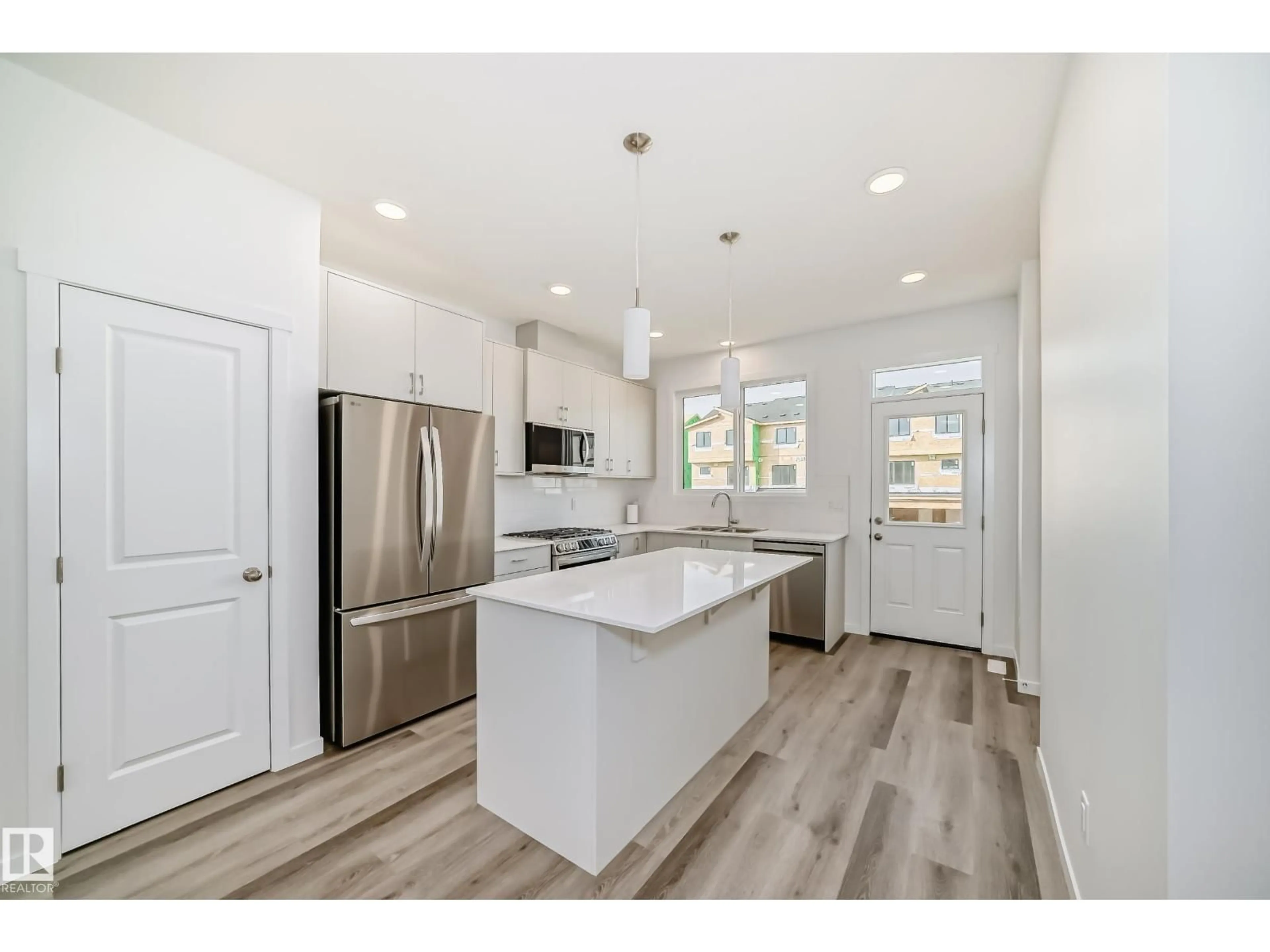 Open concept kitchen, unknown for NW - 3965 WREN LO, Edmonton Alberta T5S0T1