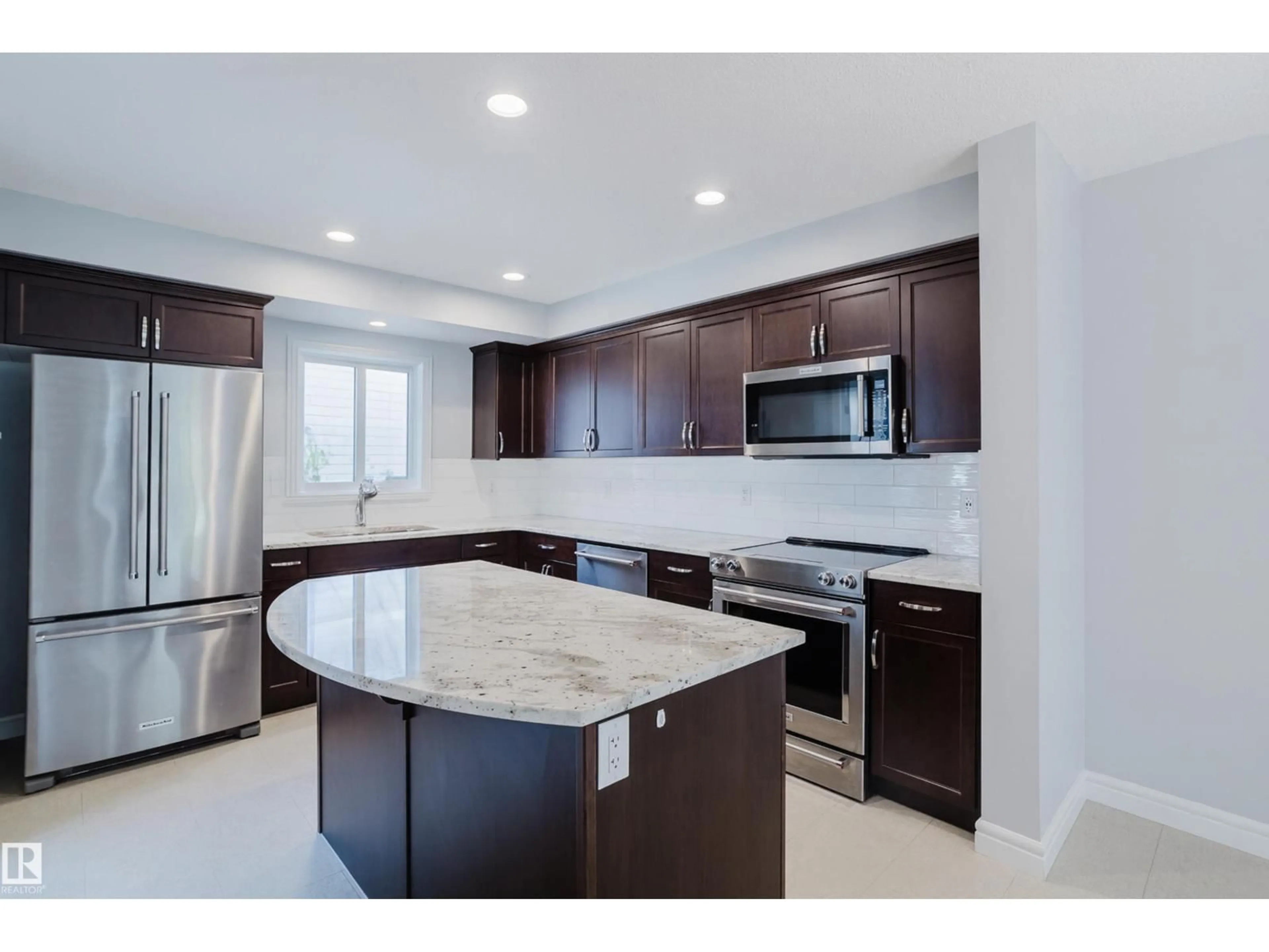 Open concept kitchen, ceramic/tile floor for SW - 184 DESROCHERS GA, Edmonton Alberta T6W3H8