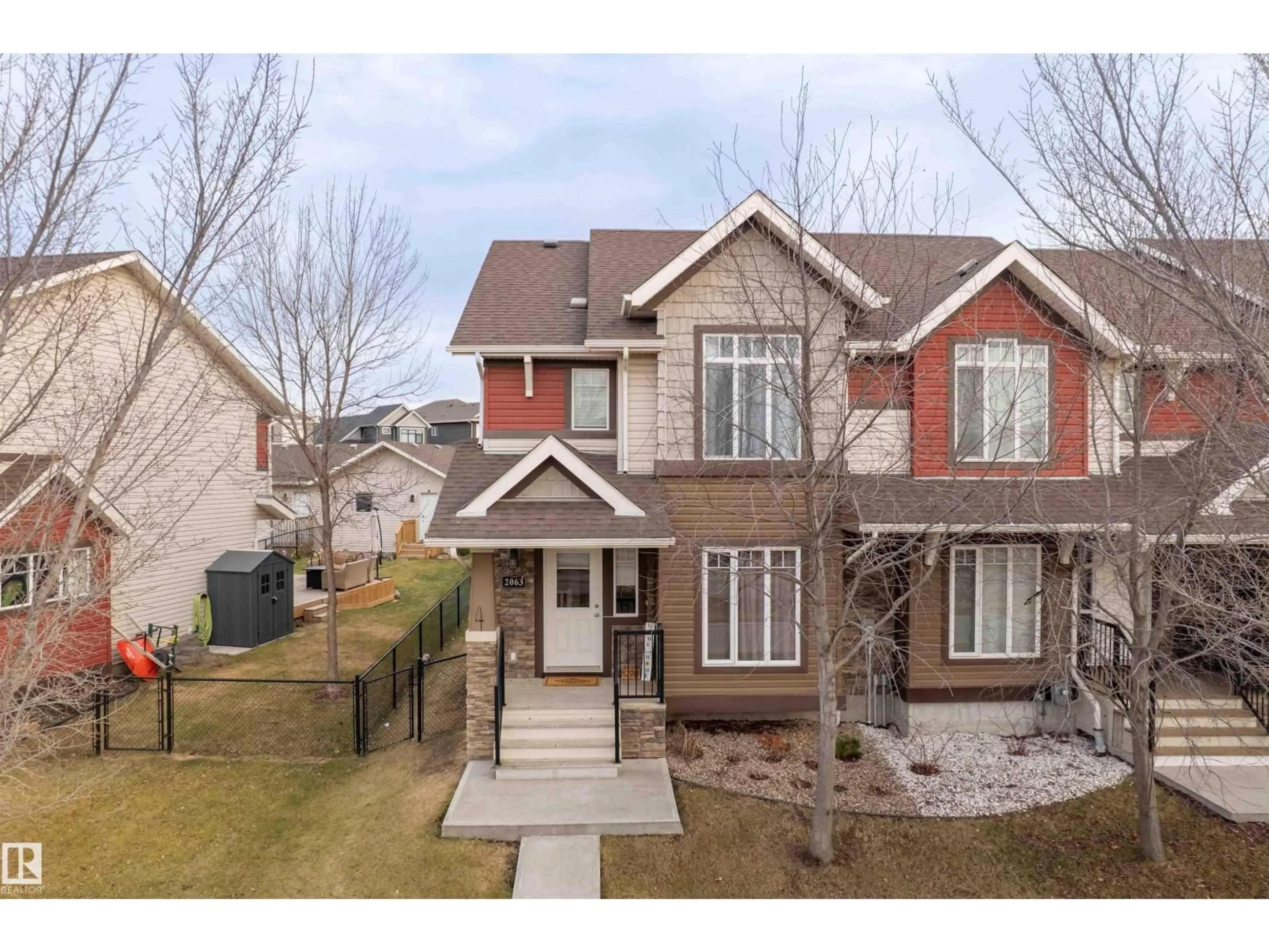 Home with brick exterior material, street for 2063 TRUMPETER WY, Edmonton Alberta T5S0E7
