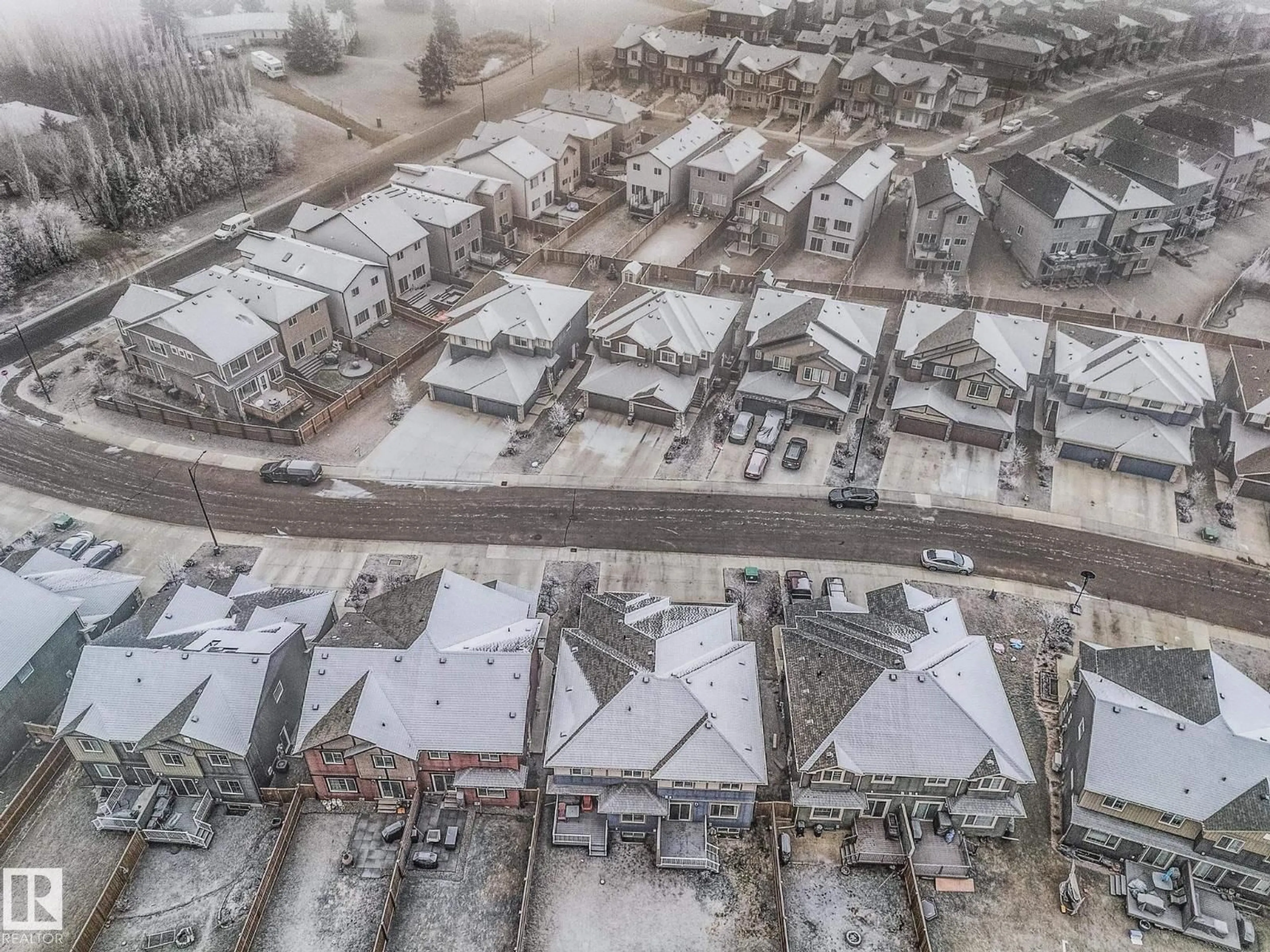 A pic from outside/outdoor area/front of a property/back of a property/a pic from drone, street for 5115 LARK CR, Edmonton Alberta T5S0N9