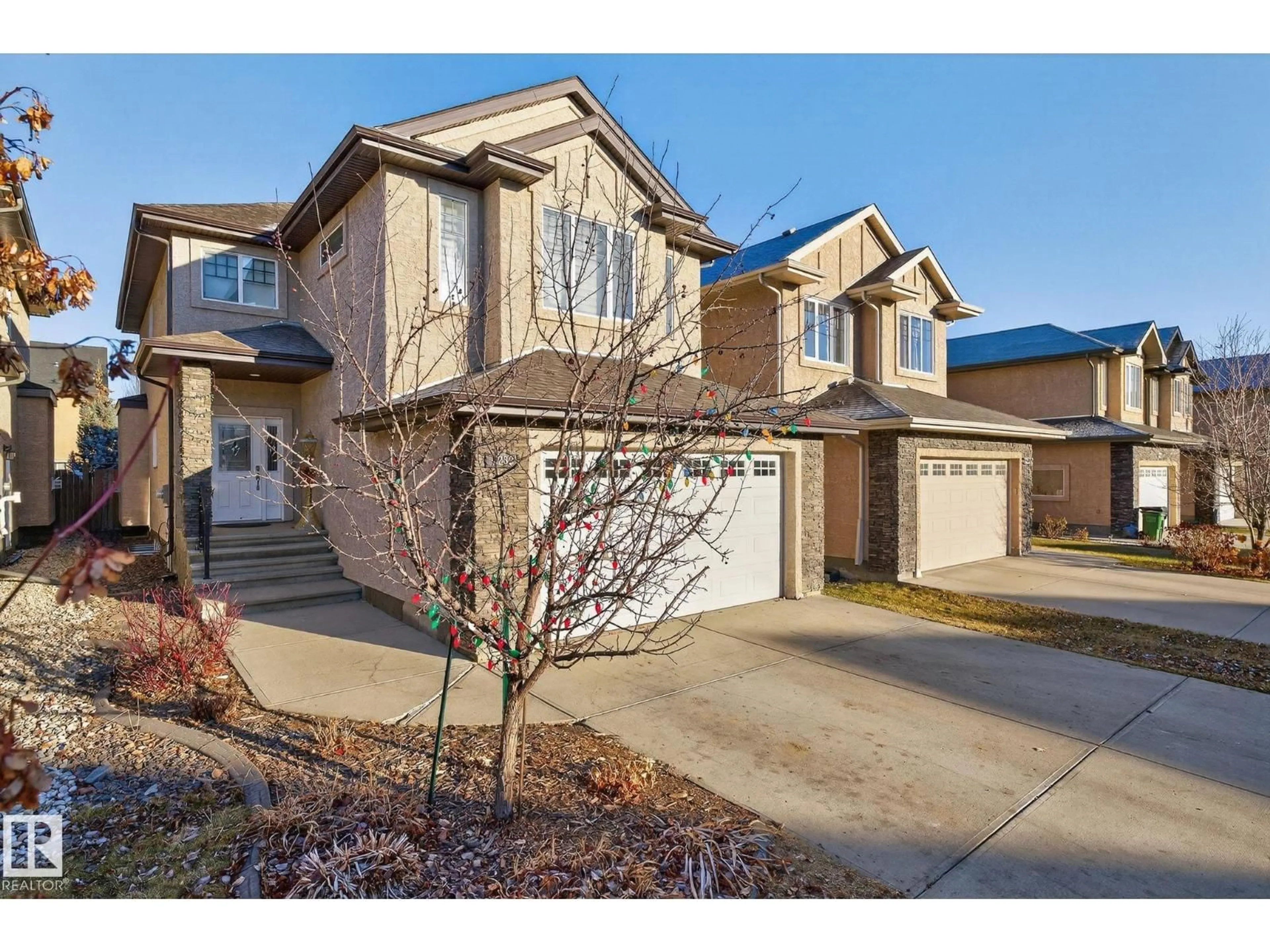 Home with brick exterior material, street for 1232 CUNNINGHAM DR, Edmonton Alberta T6W0R4