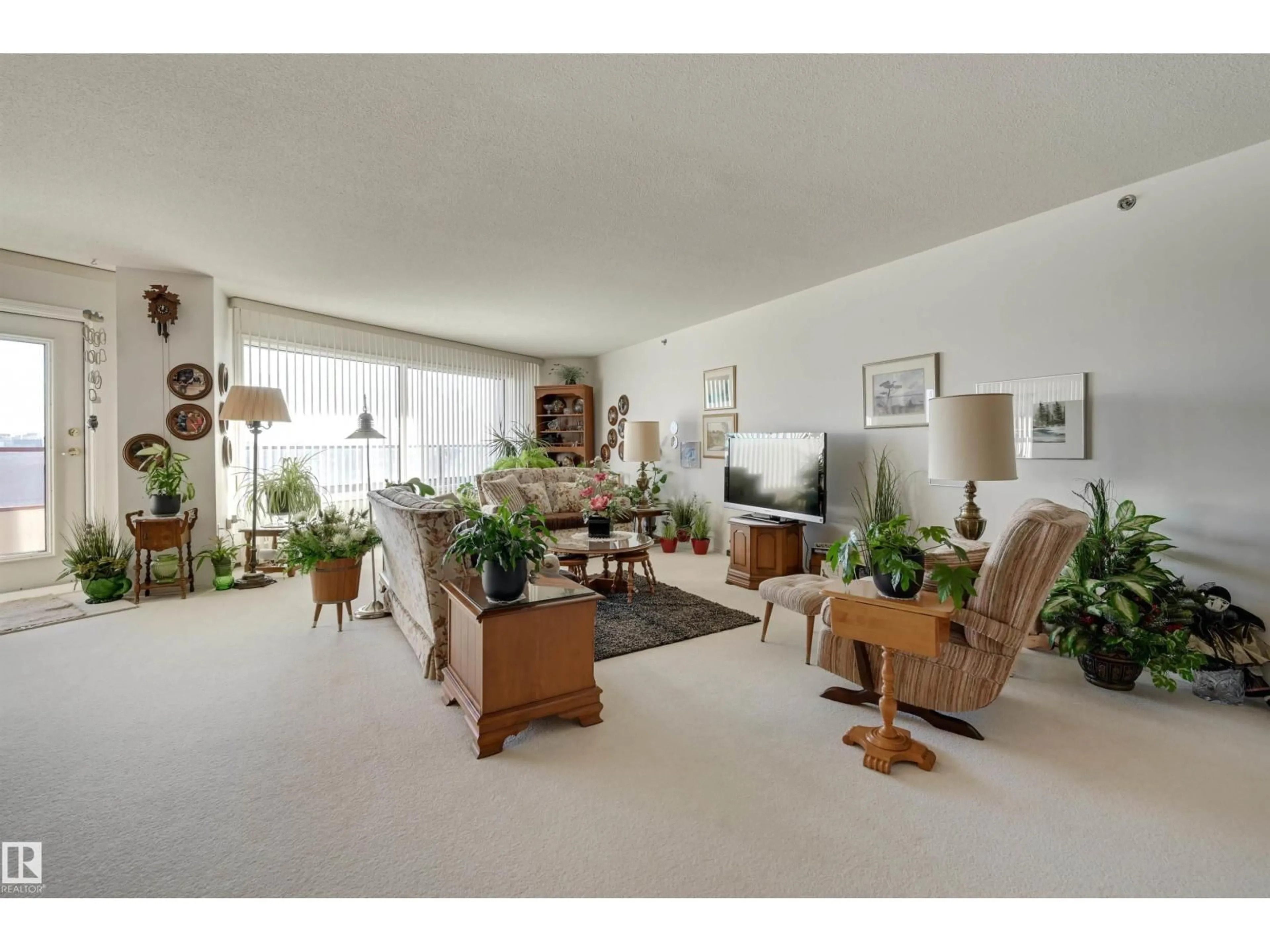 Living room with furniture, unknown for #1401 - 12319 JASPER AV, Edmonton Alberta T5N4A7