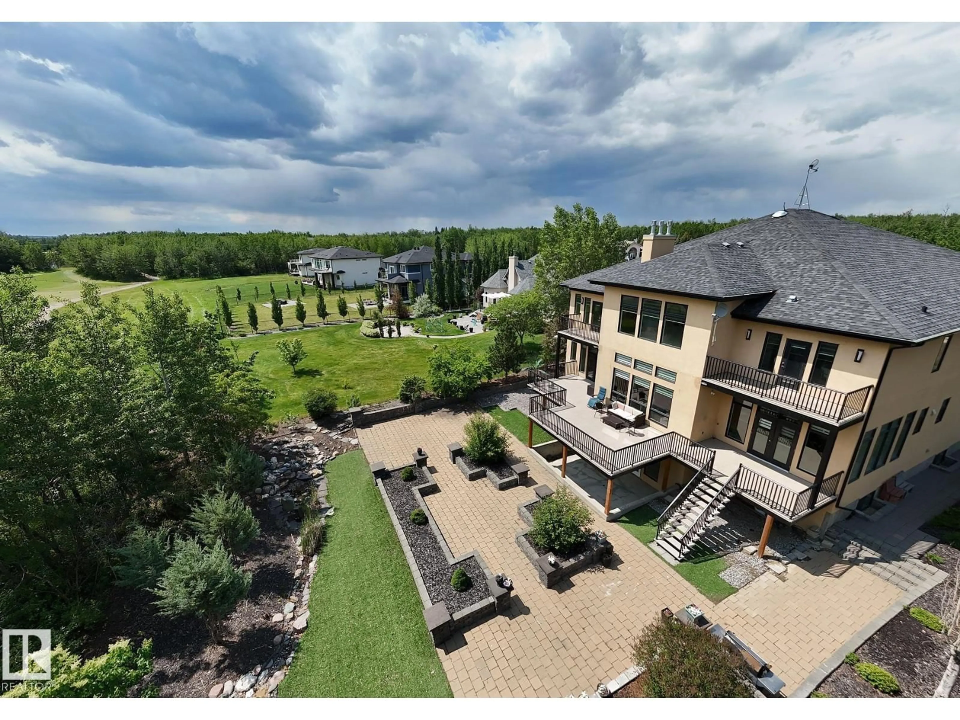 A pic from outside/outdoor area/front of a property/back of a property/a pic from drone, water/lake/river/ocean view for 51025 - 36 RGE ROAD 222, Rural Strathcona County Alberta T8C1J5