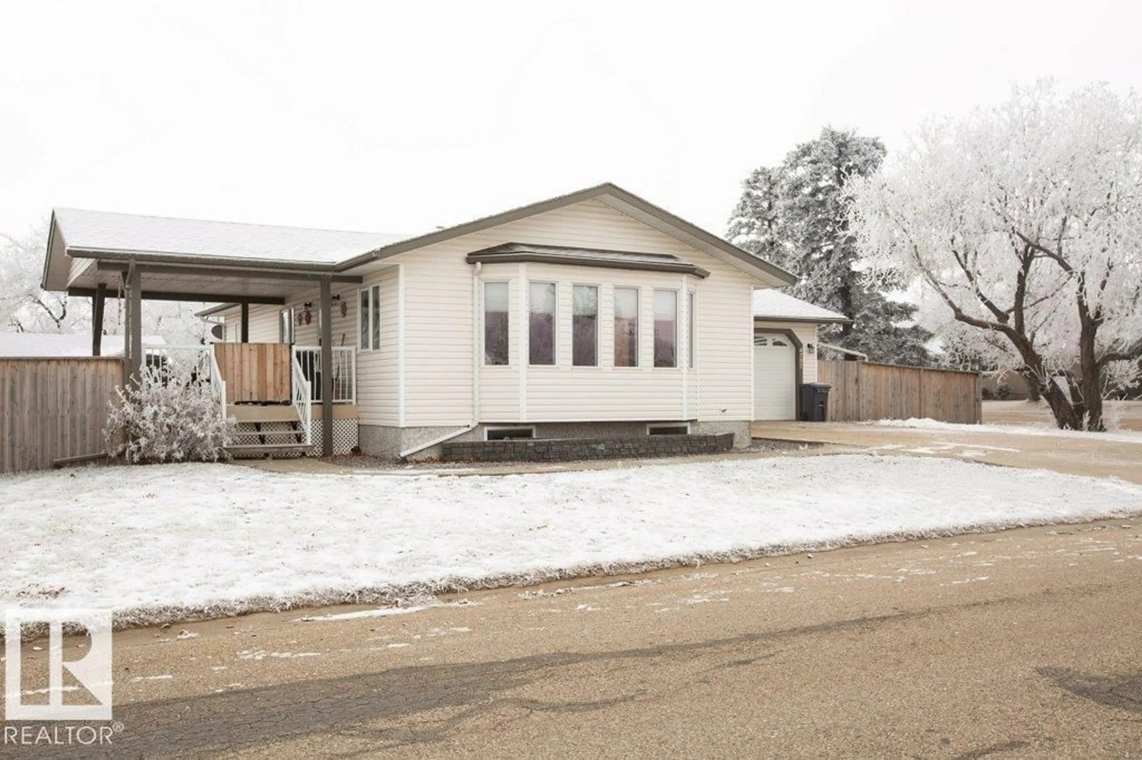 Home with vinyl exterior material, street for 4707 50 ST, Clyde Alberta T0G0P0