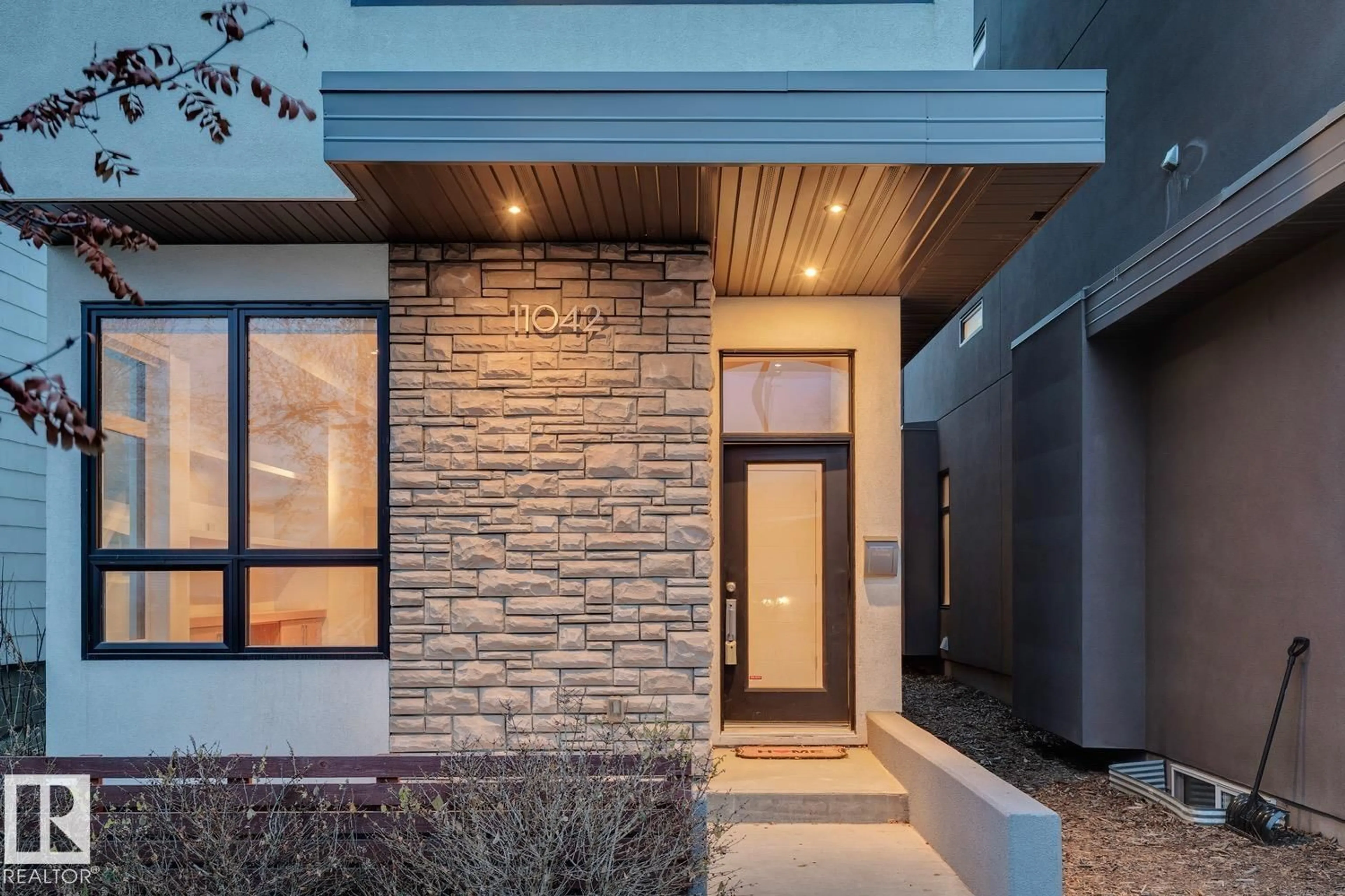 Home with brick exterior material, street for 11042 131 ST, Edmonton Alberta T5M1B8