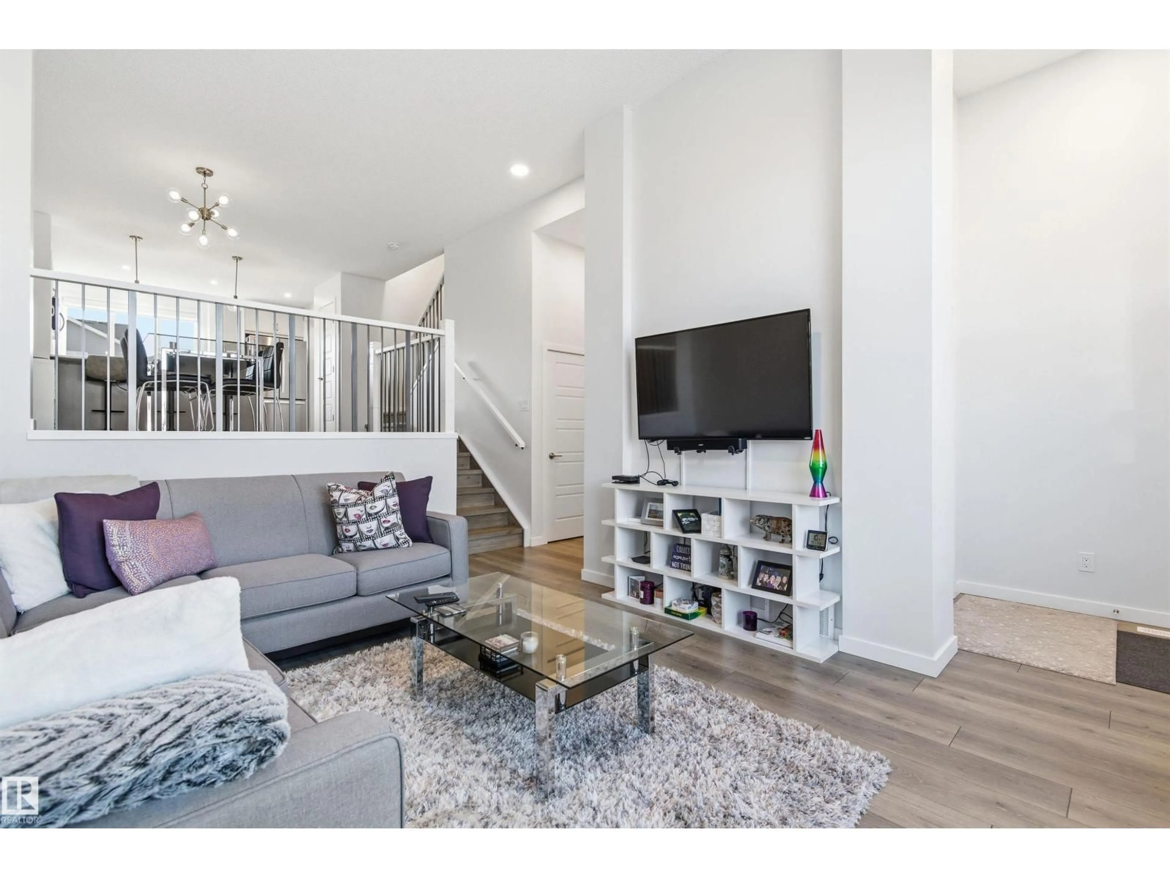 Living room with furniture, wood/laminate floor for SW - 656 35 ST, Edmonton Alberta T6X2Z1