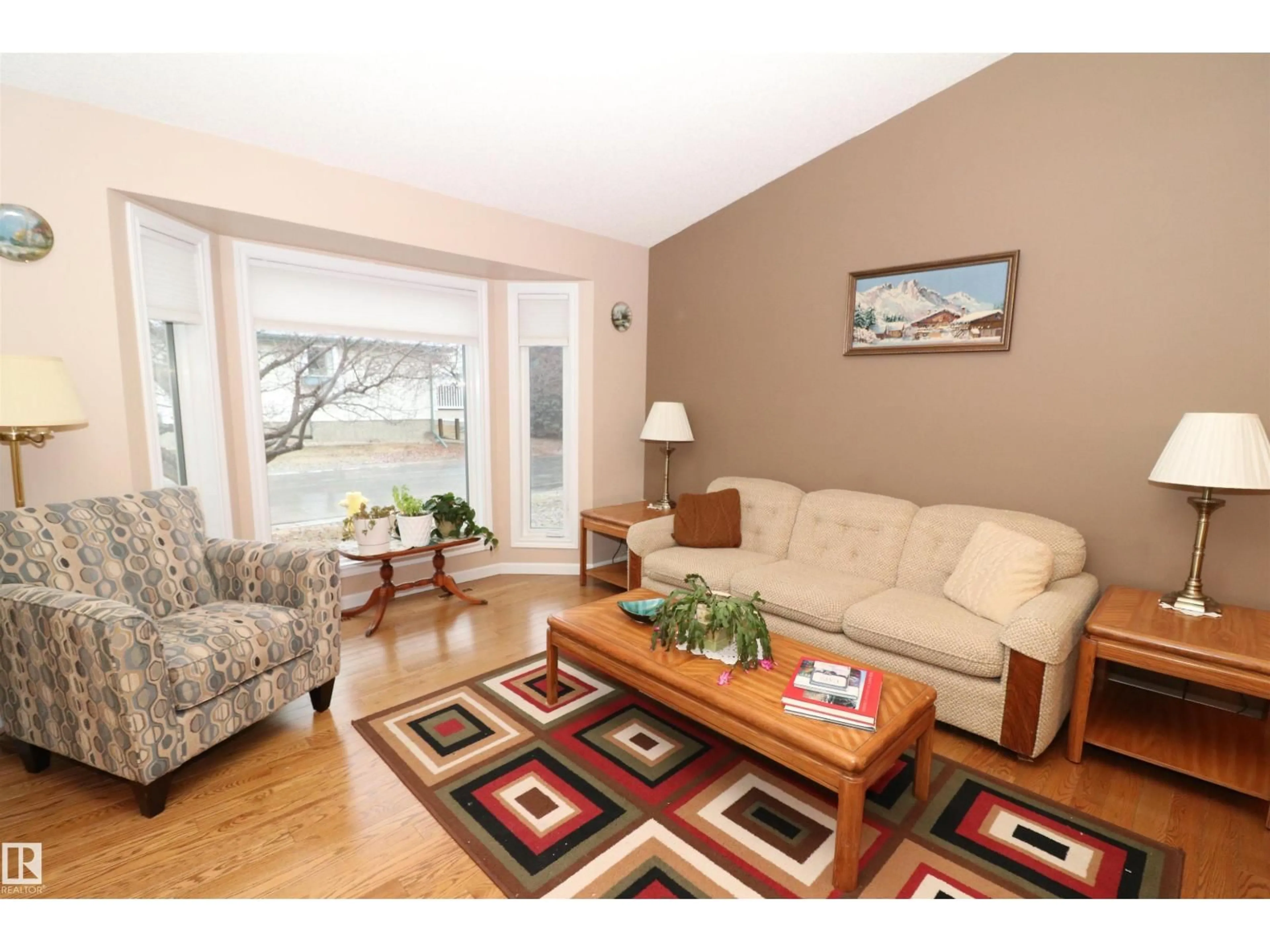 Living room with furniture, wood/laminate floor for #13 - 308 JACKSON RD, Edmonton Alberta T6L6W1