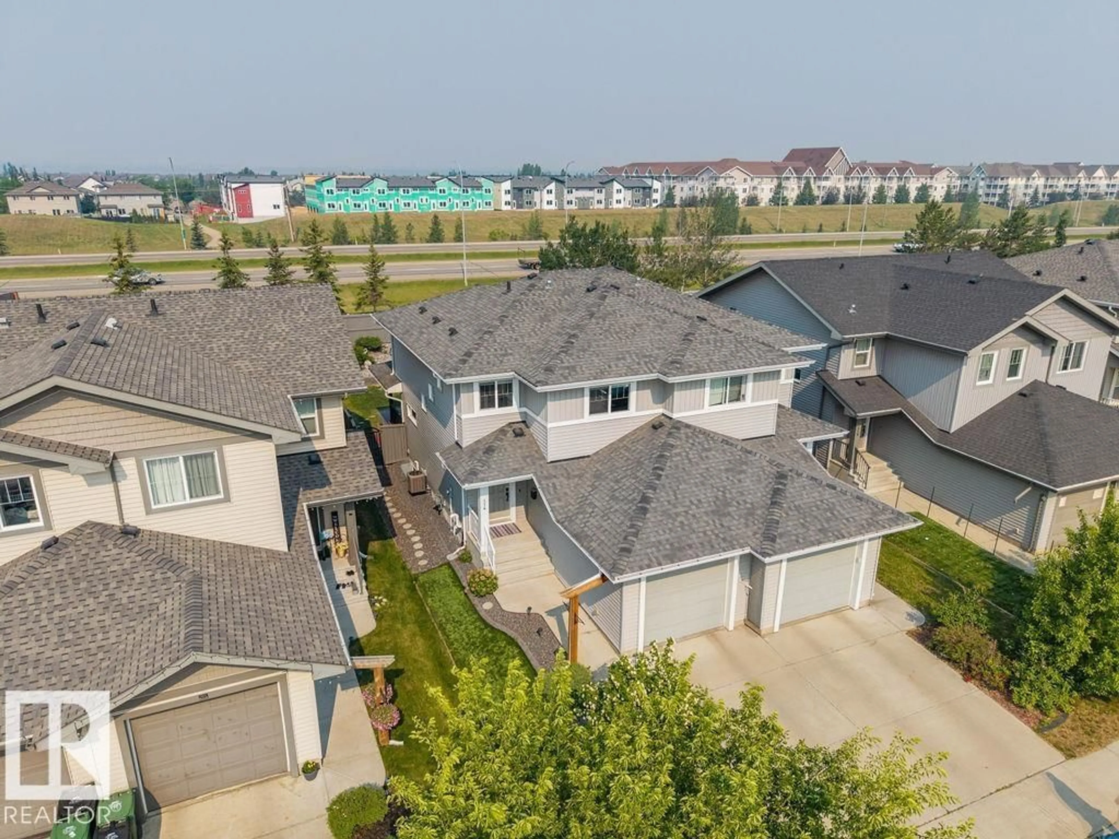 A pic from outside/outdoor area/front of a property/back of a property/a pic from drone, street for 114 RADCLIFFE, Fort Saskatchewan Alberta T8L0M6