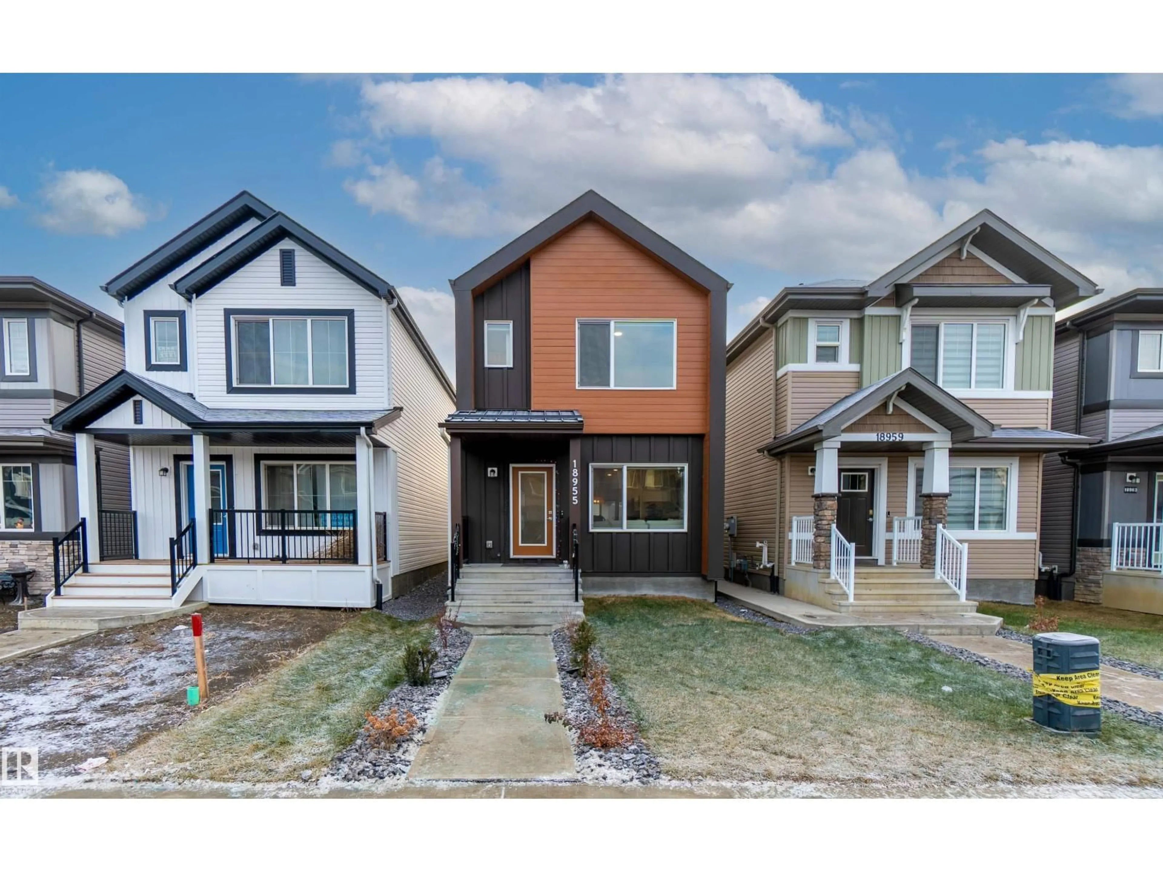 Home with vinyl exterior material, street for 18955 29 AV, Edmonton Alberta T6M3C4