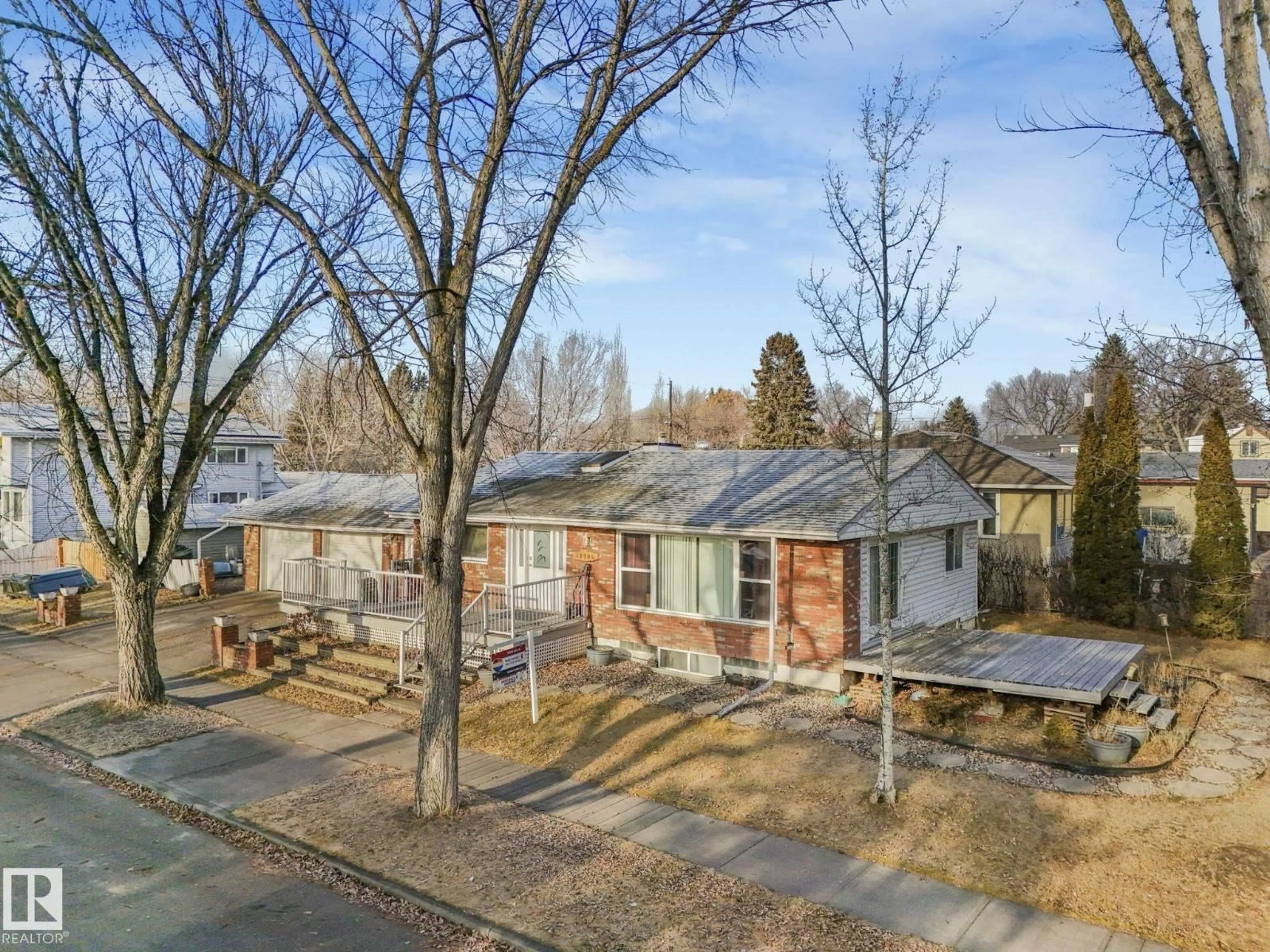 A pic from outside/outdoor area/front of a property/back of a property/a pic from drone, street for 12904 119A AV, Edmonton Alberta T5L2P4